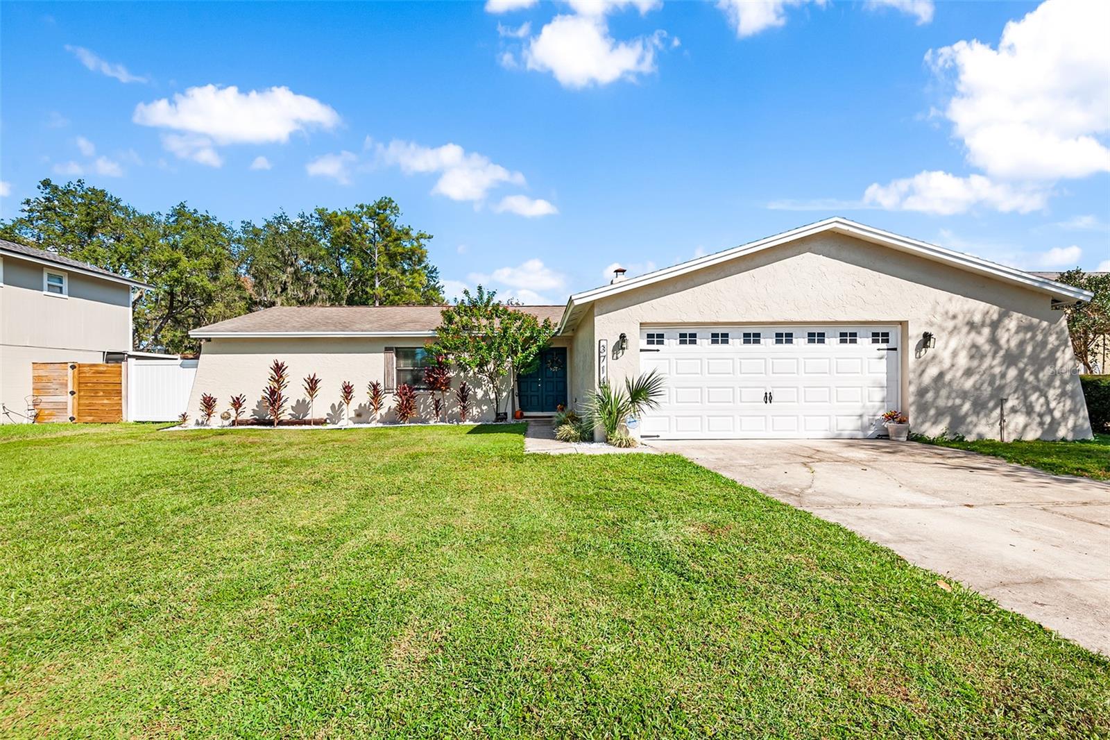 Check out this exceptional home that exudes both elegance and functionality. This property has undergone an impressive array of recent improvements, making it the epitome of maintenance free living. The backyard, enclosed by a brand-new, FULLY FENCED boundary, beautiful new landscaping, and a large screened in porch provides a private and serene outdoor retreat. Among many recent upgrades is a NEW HVAC SYSTEM, WATER HEATER, GUTTERS, and main sewer pipe. This ensures peace of mind for years to come. The heart of this home is undoubtedly the kitchen, designed for the culinary enthusiast, featuring custom cabinetry and exquisite granite countertops that blend style with functionality seamlessly. A striking stone see-through fireplace graces the living area, adding both warmth and a touch of sophistication. Throughout the home, you'll find designer wood-look tile flooring, uniting the living spaces with a timeless and cohesive aesthetic. Modern light fixtures have been thoughtfully selected, illuminating each room with a contemporary flair. Convenience meets location, as this property is strategically positioned for easy access to a variety of local shopping and dining options, allowing you to relish in the vibrant local scene and the short commute to downtown Tampa opens up a world of possibilities for entertainment, shopping, and dining, making it a perfect choice for those seeking an active and fulfilling lifestyle. Make this home yours and experience a lifestyle that combines modern luxury with everyday practicality.While all information provided in this listing is deemed to be accurate - buyer & buyer's agent must independently verify during their due diligence period | Property may be under video & audio surveillance