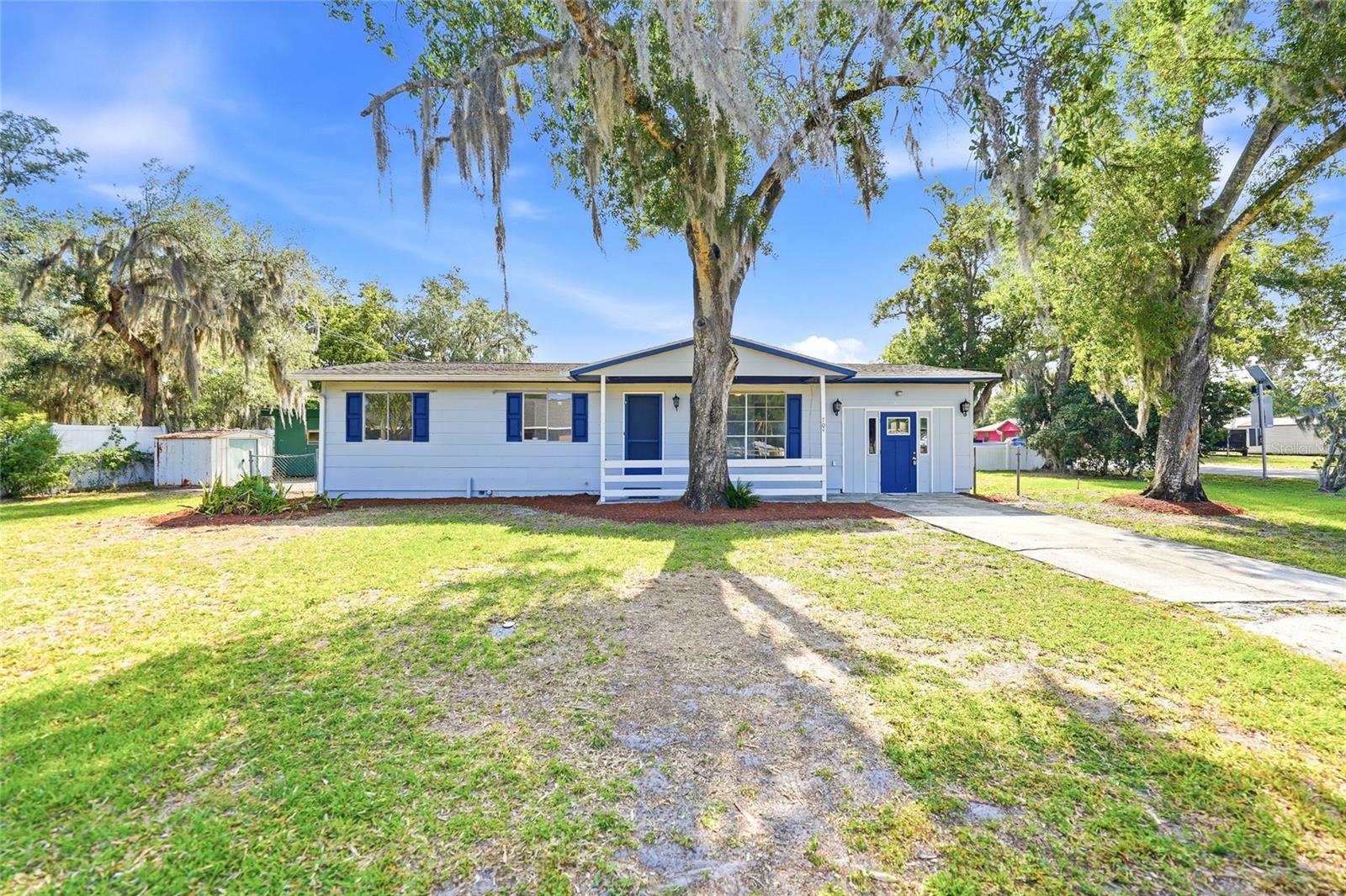 PRICED TO SELL. This is one of those homes that just feels easy the second you pull up. Clean, comfortable, and sitting pretty on a shaded corner lot, right where you want to be with quick access to everything we love about Arcadia. Step inside and you’ll immediately notice how the natural light pours into the living room, giving the whole space a bright, welcoming feel. The kitchen is big enough to actually use and enjoy, whether you’re cooking dinner or hosting family and friends, and the indoor laundry room adds that everyday convenience we all appreciate. You’ve got three spacious bedrooms, one and a half bathrooms, and a bonus room that can flex however you need it to… office, playroom, second living space, you name it. Outside is where this property really settles into its charm. Mature trees provide the kind of shade that just makes everything feel a little more peaceful. There’s a privacy fence for added comfort, two sheds for storage or hobbies, and a front porch that is basically calling your name for slow mornings or winding down in the evening with a glass of sweet tea. If you’re looking for something move-in ready with space, function, and that laid-back Arcadia feel… this one checks all the boxes. (CASH SALE OR PRIVATE FINANCING. Roof is at the end of it's life)