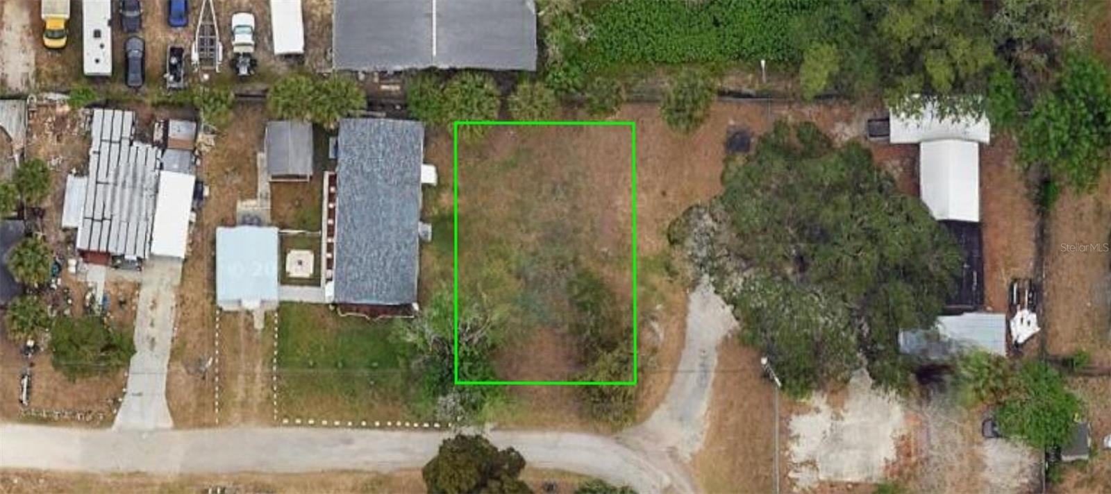 Rare opportunity to own a vacant lot within an established mobile home community in Port Richey. This property previously had a mobile home in place and includes an existing septic system, offering a strong foundation for redevelopment or replacement (buyer to verify all intended uses). Zoned 00C2 (General Commercial) in Pasco County, providing flexible use potential while benefiting from its historical residential use within the park. Ideal for investors or buyers seeking multiple options, whether for a new mobile home setup or alternative permitted uses. Conveniently located with quick access to US-19, shopping, dining, and surrounding commercial activity.