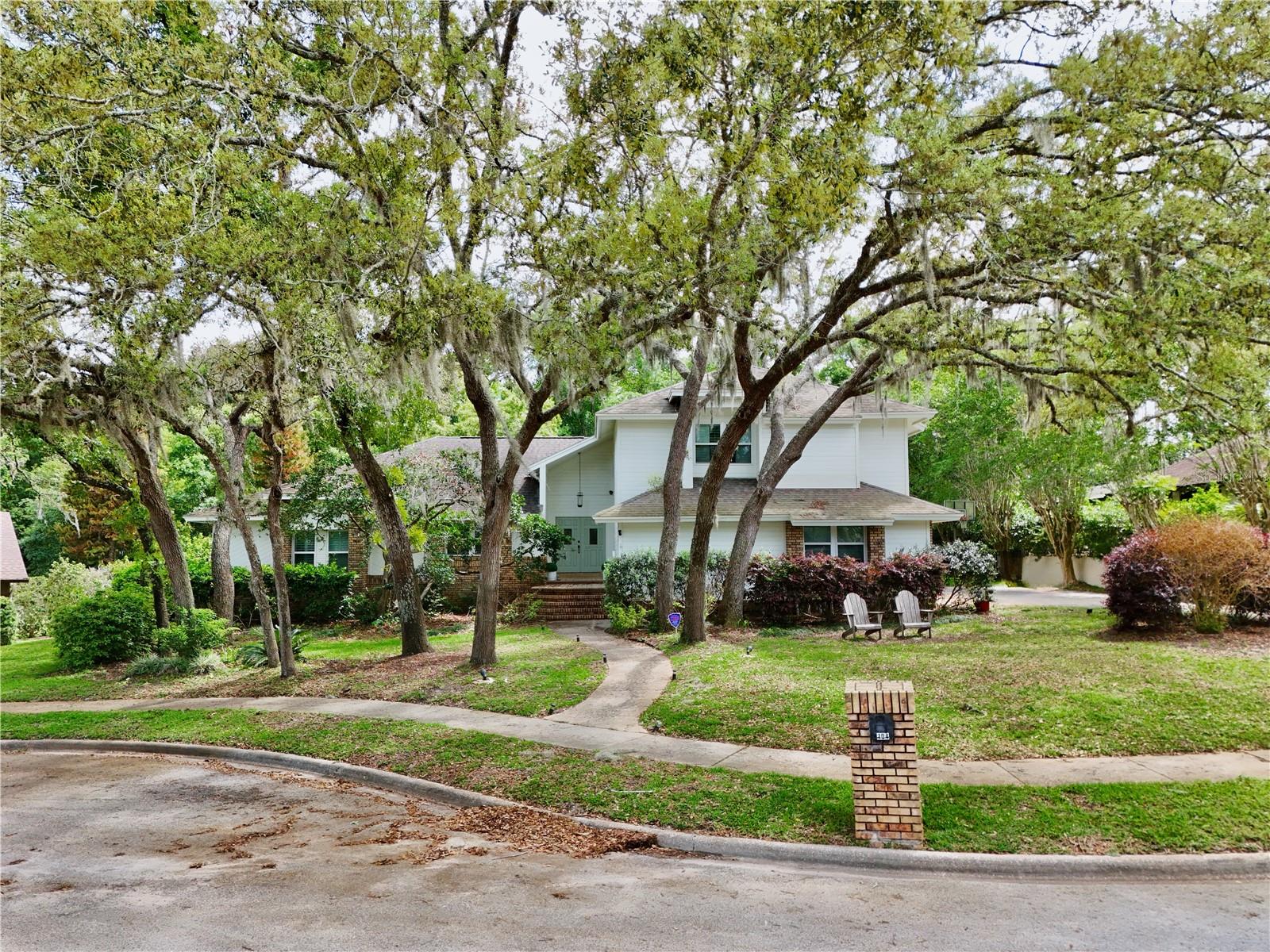 Recent contract fell through. Experience the ultimate Florida lifestyle in this stunning 5-bedroom, 3-bathroom contemporary split-level home in desirable Sweetwater Oaks. Spanning over 3,500 square feet on a quiet cul-de-sac, this residence perfectly blends modern design with functional family living. Entertainer's dream Kitchen & Great Room. The heart of the home is an impressive open-concept kitchen and family room combination featuring soaring vaulted ceilings. Beautiful granite countertops, a central island with a built-in sink and dishwasher, a versatile two-level countertop, and a sun-drenched breakfast nook. The great room showcases a custom stone fireplace with built-in shelving. Three-panel sliding glass pocket doors disappear into the walls, seamlessly merging the interior with the screened-in pool area. Formal Dining & Living. Enjoy vaulted ceilings and multiple expansive windows to enjoy peaceful views of the private pool. The primary suite is privately tucked away on the first level. A versatile 5th bedroom flex space on the main floor serves perfectly as a home office or den. Three additional bedrooms, a full bathroom, and a spacious loft are located on the second floor, providing a dedicated space for family, playroom, or guests. Rest easy with smart outdoor controlled lighting designed for security, holidays, and special events. Beyond your front door, Sweetwater Oaks offers a premier lifestyle with exclusive resident-only access to Lake Brantley at Sweetwater Beach with a beautiful sandy beach for swimming, basketball court, beach volleyball, playground, boat dock, and boat ramp for skiing and fishing. Additionally, residents of Sweetwater Oaks community can enjoy another private access at Riverbend Park. This beautiful expansive park features tennis and basketball courts, baseball and soccer fields, canoeing, and kayaking with access to Wekiva River. Don't miss this rare opportunity to own a piece of paradise in one of Longwood’s most sought-after communities. Schedule your private tour today!