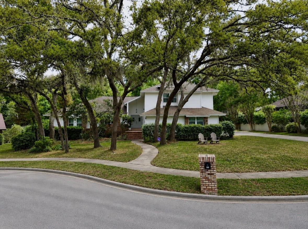 Recent contract fell through. Experience the ultimate Florida lifestyle in this stunning 5-bedroom, 3-bathroom contemporary split-level home in desirable Sweetwater Oaks. Spanning over 3,500 square feet on a quiet cul-de-sac, this residence perfectly blends modern design with functional family living. Entertainer's dream Kitchen & Great Room. The heart of the home is an impressive open-concept kitchen and family room combination featuring soaring vaulted ceilings. Beautiful granite countertops, a central island with a built-in sink and dishwasher, a versatile two-level countertop, and a sun-drenched breakfast nook. The great room showcases a custom stone fireplace with built-in shelving. Three-panel sliding glass pocket doors disappear into the walls, seamlessly merging the interior with the screened-in pool area. Formal Dining & Living. Enjoy vaulted ceilings and multiple expansive windows to enjoy peaceful views of the private pool. The primary suite is privately tucked away on the first level. A versatile 5th bedroom flex space on the main floor serves perfectly as a home office or den. Three additional bedrooms, a full bathroom, and a spacious loft are located on the second floor, providing a dedicated space for family, playroom, or guests. Rest easy with smart outdoor controlled lighting designed for security, holidays, and special events. Beyond your front door, Sweetwater Oaks offers a premier lifestyle with exclusive resident-only access to Lake Brantley at Sweetwater Beach with a beautiful sandy beach for swimming, basketball court, beach volleyball, playground, boat dock, and boat ramp for skiing and fishing. Additionally, residents of Sweetwater Oaks community can enjoy another private access at Riverbend Park. This beautiful expansive park features tennis and basketball courts, baseball and soccer fields, canoeing, and kayaking with access to Wekiva River. Don't miss this rare opportunity to own a piece of paradise in one of Longwood’s most sought-after communities. Schedule your private tour today!