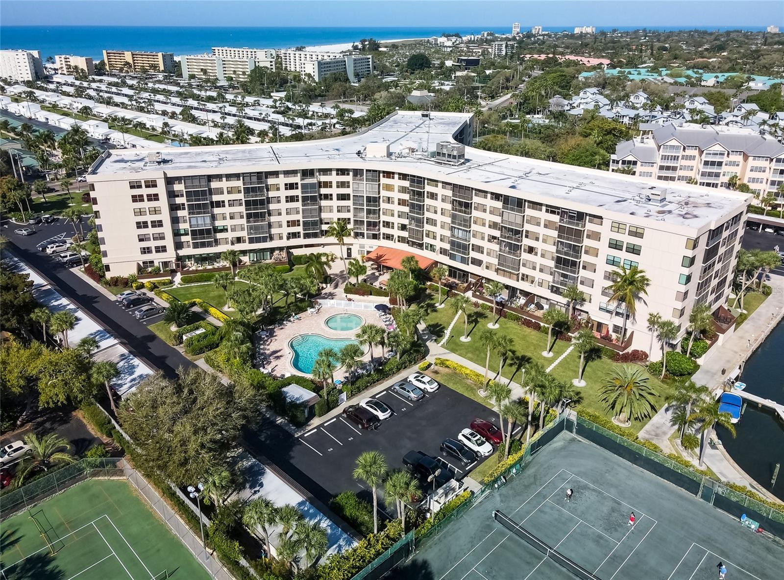 COASTAL RESORT LIVING JUST MINUTES FROM SIESTA KEY BEACH!

Enjoy the best of Siesta Key living in this beautifully updated and move-in-ready condominium at Harbor Towers, one of the island's most sought-after waterfront communities. Located just a short distance from the world-renowned Siesta Key Beach, this large one-bedroom, one-bath residence offers beautiful bay and intracoastal water views, exceptional amenities, and outstanding ownership value.

Recent improvements provide peace of mind, including a new air conditioning system (2026), new hot water heater (2026), fresh interior paint, a new window, and a new screened lanai door. The spacious floor plan features an oversized bedroom with room for multiple sleeping arrangements, generous closet space, a full-size kitchen with refrigerator and dishwasher, keypad entry, and abundant natural light.

Harbor Towers offers an impressive collection of resort-style amenities, including a heated pool and spa, fitness center, marina, fishing pier, boat slips available for lease, tennis courts, clubhouse, walking paths, grilling areas, and secured gated access. A deeded covered parking space is conveniently located near the building entrance.

Ideal as a primary residence, vacation getaway, or investment opportunity. Historical rental activity reflects gross rental income of approximately $34,000 annually; future rental income may vary. All special assessments have been paid, HOA fees are paid through 2026, and there are no other outstanding fees, providing added peace of mind for the next owner.

Ideally situated near Siesta Key Village, residents enjoy convenient access to restaurants, shopping, entertainment, and beach access, with trolley and transportation options nearby. Experience the convenience, amenities, and coastal lifestyle that make Harbor Towers one of Siesta Key's most desirable waterfront communities.

With elevator access, a practical layout, convenient amenities, and low-maintenance living, this residence offers comfort and ease of ownership.