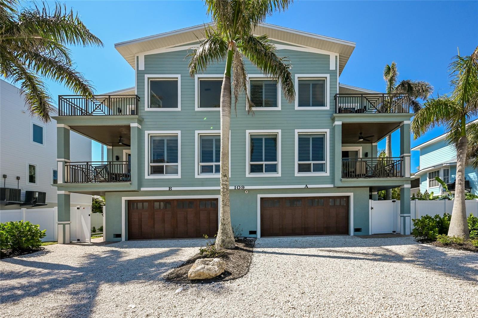 Perfectly positioned in the middle of the Gulf and the Intercostal, you get the best of both worlds!  Being sold as a whole- each side is 4 bedrooms and 3 bathrooms and both have their own pool!!  Offering incredible views in every direction because it’s situated in the best location on the entire island! The island is only 150 yards wide where this 3-story condo is located. The Gulf of Mexico is merely 75 yards to the west, and Florida’s Intracoastal Waterway is 75 yards to the east. Relax on the 3rd-floor, ceramic-tiled balcony with screened-in lanai, and gaze out across the serene aquamarine Gulf waters, the Intracoastal Waterway, and Florida’s Sunshine Bridge over Tampa Bay and the Bradenton Beach Marina.  Each side is 2,678 sq ft luxury condo is one-half of a duplex (shared wall format with extra thick/soundproof wall.) But everything about the condo is private, not shared. Heated pool, outdoor kitchen and large garage, the list goes on.  Possibilities are endless, rent out as a whole for investment or live on one side and rent the other.  Enjoy breathtaking sunrises and sunsets from multiple decks overlooking both the bay and the Gulf. Leave your car at home and walk to the beach, restaurants, shopping, the pier, and Bridge Street!  Come explore everything this stunning home has to offer!