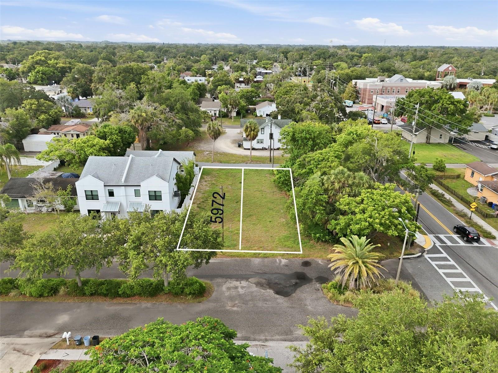 Pre-Construction. To be built. Pre-Construction. To be built. Customize your dream home in the heart of Downtown New Port Richey. This to-be-built 3-bedroom, 2.5-bathroom townhome offers 1,835 square feet of thoughtfully designed living space and the rare opportunity to select your finishes and personalize the home to fit your style. Best of all, there is no HOA and no CDD. No deed or lease restrictions! The open-concept first floor is designed for modern living and entertaining, featuring a spacious living room, dining area, and kitchen seamlessly connected into one inviting space. The kitchen will include granite countertops, stainless steel appliances, ample cabinetry, and a large center island perfect for casual dining, meal preparation, or gathering with family and friends. Conveniently located on the first floor, the primary suite will feature a large walk-in closet, private en-suite bathroom, and sliding glass doors leading directly to the outdoor patio. Upstairs, you'll find two additional bedrooms and a full shared bathroom, creating a functional layout that provides privacy and flexibility. Enjoy the peace of mind that comes with brand-new construction, offering the latest in design, efficiency, and low-maintenance living. Located just moments from Downtown New Port Richey, you'll have easy access to local restaurants, cafes, breweries, boutique shopping, the historic Suncoast Theater, community events, and entertainment. Sims Park, Morton Plant North Bay Hospital, and the New Port Richey Recreation & Aquatic Center are all nearby, with the aquatic center located less than half a mile away. Zoned schools, Gulf beaches, and major roadways are also within a short drive, making this an exceptional opportunity to build a new home in one of Pasco County's most vibrant and walkable locations.