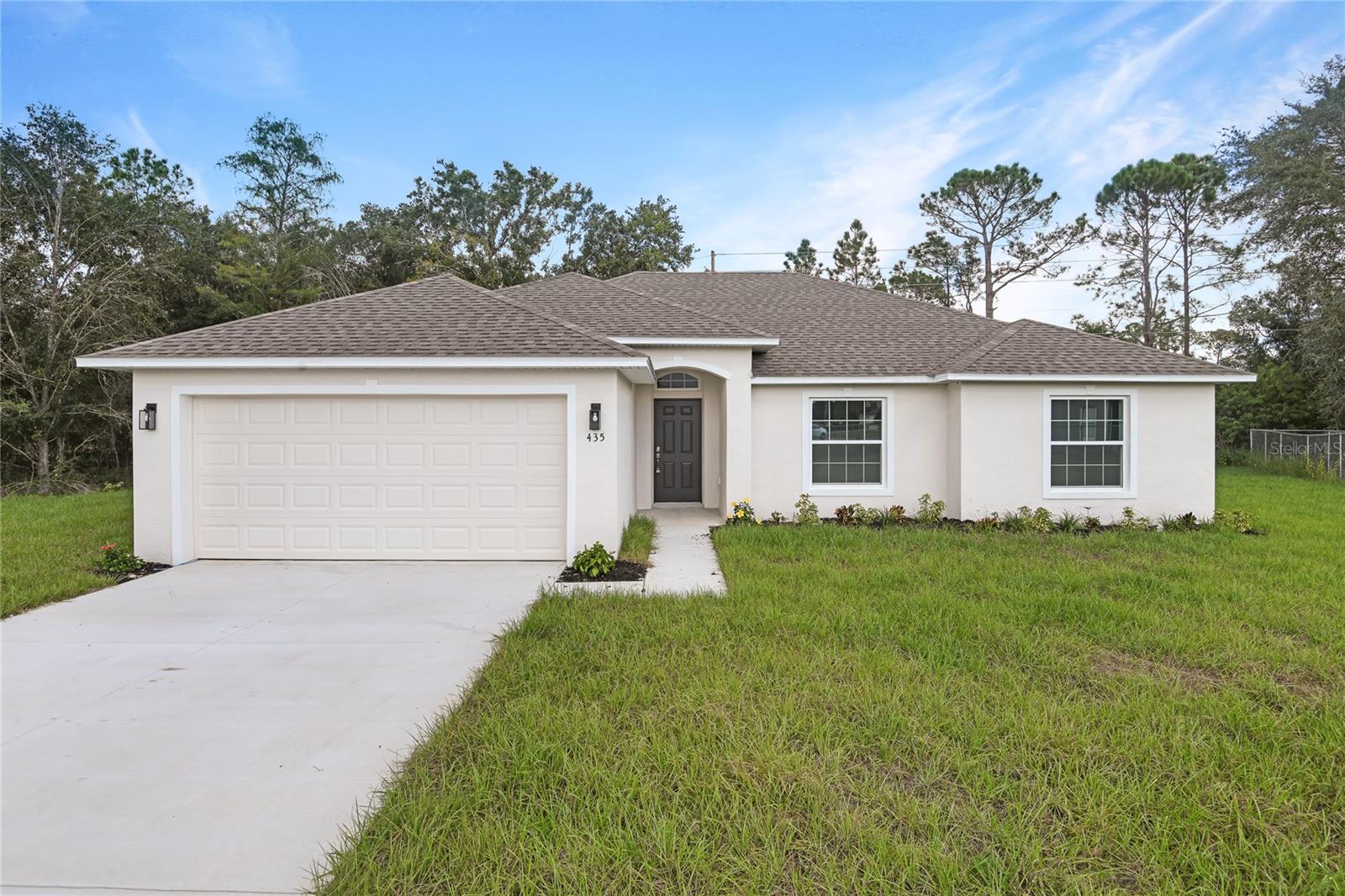 New Construction with Included Upgrades! Located in Poinciana Village 7 Polk County. Welcome to this beautifully designed 4-bedroom, 2-bath home featuring an inviting open-concept floor plan. The modern kitchen is equipped with quartz countertops, 42-inch upper cabinets for ample storage, and Samsung stainless steel appliances. The spacious primary suite features a walk-in closet and luxurious en-suite bath. Both bathrooms are enhanced with designer wall tile, adding a modern, upscale touch. Enjoy durable tile flooring with upgraded underlayment for enhanced comfort and sound reduction. Step outside to the covered lanai, an ideal space for relaxing, dining, or entertaining. With premium finishes and thoughtful upgrades already included, this move-in-ready home offers exceptional value and contemporary style. Additionally, this home comes with a 10-year structural warranty, providing peace of mind for your investment. Schedule your private tour today! SAMPLE PHOTOS, actual homes as constructed may not contain the features and layouts depicted and may vary from image(s).