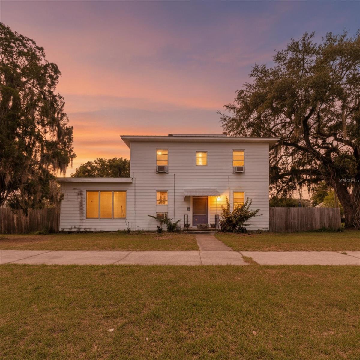 Home has an Assumable Mortgage with a 3.2% interest rate.  Discover the perfect blend of flexibility, income potential, and modern living with this unique property situated on just under half an acre! Currently configured as a spacious multi-functional residence, this property offers endless possibilities for homeowners, investors, or multi-generational living.

The upstairs features a private 2-bedroom, 1-bath apartment complete with its own kitchen and two separate entrances, making it ideal for rental income, guests, or extended family. Downstairs has been thoughtfully converted into a large 3-bedroom, 3-bath living space with an additional studio that has a full bathroom and a seperate entrance.  This studio is currently operating as a home hair salon — perfect for a home business, creative workspace, or easy conversion into additional living quarters.

With 3 separate electric meters already in place, the property offers the potential to be divided into up to 3 separate units, creating an incredible opportunity for short-term rentals, long-term tenants, or house hacking. The expansive lot provides plenty of outdoor space for entertaining, parking, or future improvements.

Whether you’re looking for a versatile primary residence, an investment opportunity, or a property that can adapt to your lifestyle, this one-of-a-kind home is packed with potential!