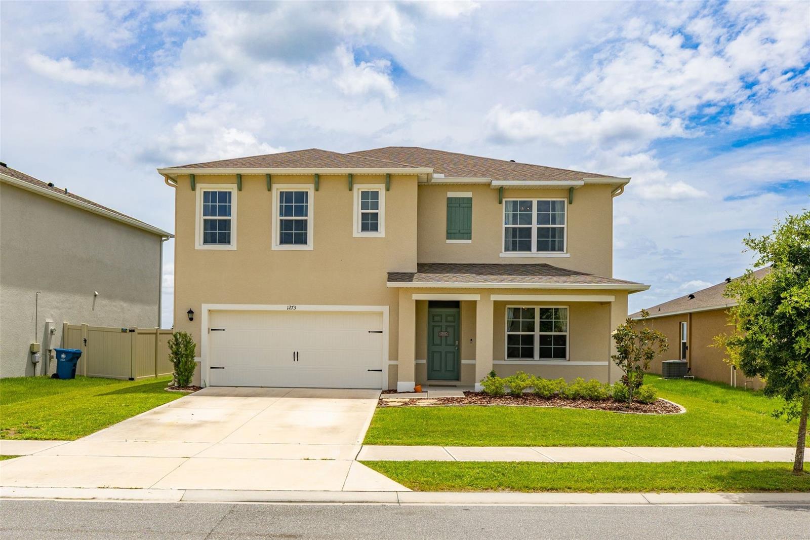 DON'T MISS THIS ALMOST NEW 5 BEDROOM, 3 FULL BATH MOVE IN READY HOME in the growing area of Davenport, Florida!! Located in the wonderful amenity filled community of Charles Cove, this well maintained home combines comfort, style, and functionality. The open floor plan features fresh interior paint, a spacious kitchen with a large pantry, reverse osmosis system, and seamless flow into the living and dining areas.  Upstairs, you’ll find a versatile sitting area, convenient laundry room, 2 full bathrooms, and a HUGE PRIMARY SUITE with two closets. Ample storage can be found throughout the home.  Enjoy relaxing on the charming front porch or entertaining on the brand new large paver lanai that's perfect for relaxing or entertaining.  The fully fenced backyard overlooking the preserve offers plenty of privacy and ROOM FOR A POOL!!  Additional highlights include, IMPACT WINDOWS, a water softener system, gutters with buried downspout extensions, plantation shutters on the back slider, and tons more meaningful upgrades throughout the home so that you can enjoy peace of mind living for years to come!!  AND TALK ABOUT LOCATION?!?!  Your new home (NOT IN A FLOOD ZONE!!) is close to everything including shopping, restaurants, world class golf, DISNEY WORLD, 2 spring training venues (Yankees and Tigers), and so much more!!  Call today for your private showing and come live the Florida Lifestyle!!