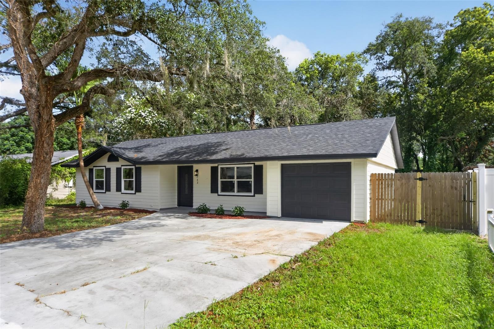 Virtually Staged. Completely renovated and move-in ready! This beautifully updated 3-bedroom, 2-bath home offers peace of mind with a 2022 roof, 2022 A/C, and new windows. Inside, you'll find a bright, open floor plan featuring a stunning new kitchen with white shaker cabinetry, quartz countertops, stainless steel appliances, and stylish finishes throughout. New luxury vinyl plank flooring flows seamlessly through the home, complemented by fresh interior and exterior paint, updated bathrooms, new trim, modern hardware, and contemporary fixtures. Every detail has been thoughtfully updated, making this home truly turnkey. Conveniently located in Longwood with easy access to I-4, SR 434, shopping, dining, and everyday conveniences. Just minutes from Lake Mary, historic downtown Longwood, Wekiwa Springs State Park, and Seminole County's highly regarded parks and recreation, this home offers the perfect blend of modern updates and an excellent Central Florida location.