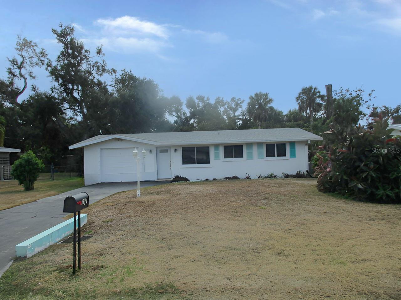 This ranch-style home offers potential on a lot close to town. This property presents a compelling investment opportunity with much potential. The two-bedroom, one-bathroom configuration offers flexibility for renovation and customization to suit various needs. The single-level design provides practical living convenience while allowing for creative updates and improvements. With thoughtful renovation, this home could be transformed into an attractive residence that maximizes its inherent possibilities and location advantages. Schedule your showing today to explore this ranch home's potential and spacious layout.  This is a Fannie Mae Homepath property.