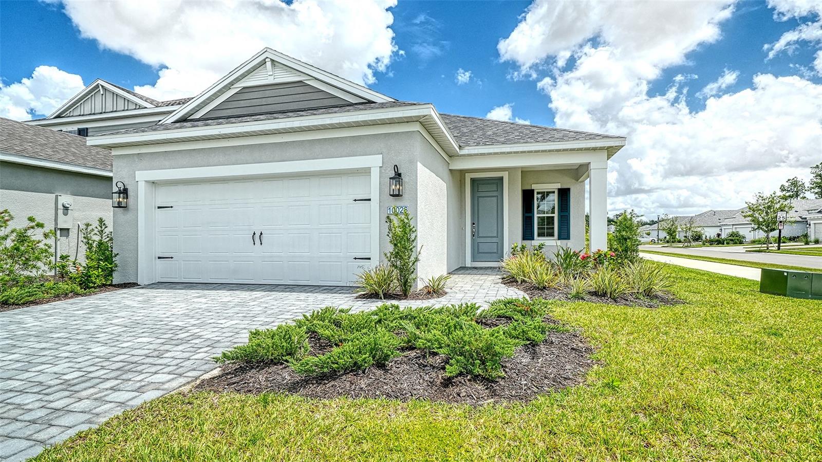 Experience the carefree Florida lifestyle in the Dream 2, a beautifully designed single-family home offering 3 bedrooms, 2 baths, a den, and a 2-car garage. Thoughtfully crafted for both comfort and functionality, this open-concept floor plan features a spacious kitchen with a corner pantry, center island, abundant counter space, and an adjoining dining area—ideal for everyday living and entertaining. The great room opens to the covered lanai through sliding glass doors, creating a seamless indoor-outdoor living experience.

The private primary suite serves as a relaxing retreat with two closets, dual vanities, and a walk-in shower. Two additional bedrooms, a full guest bath, a dedicated laundry room, and a versatile den perfect for a home office, hobby room, or flex space complete the layout. Situated on a desirable corner homesite, this residence offers added privacy, enhanced curb appeal, and extra outdoor space.