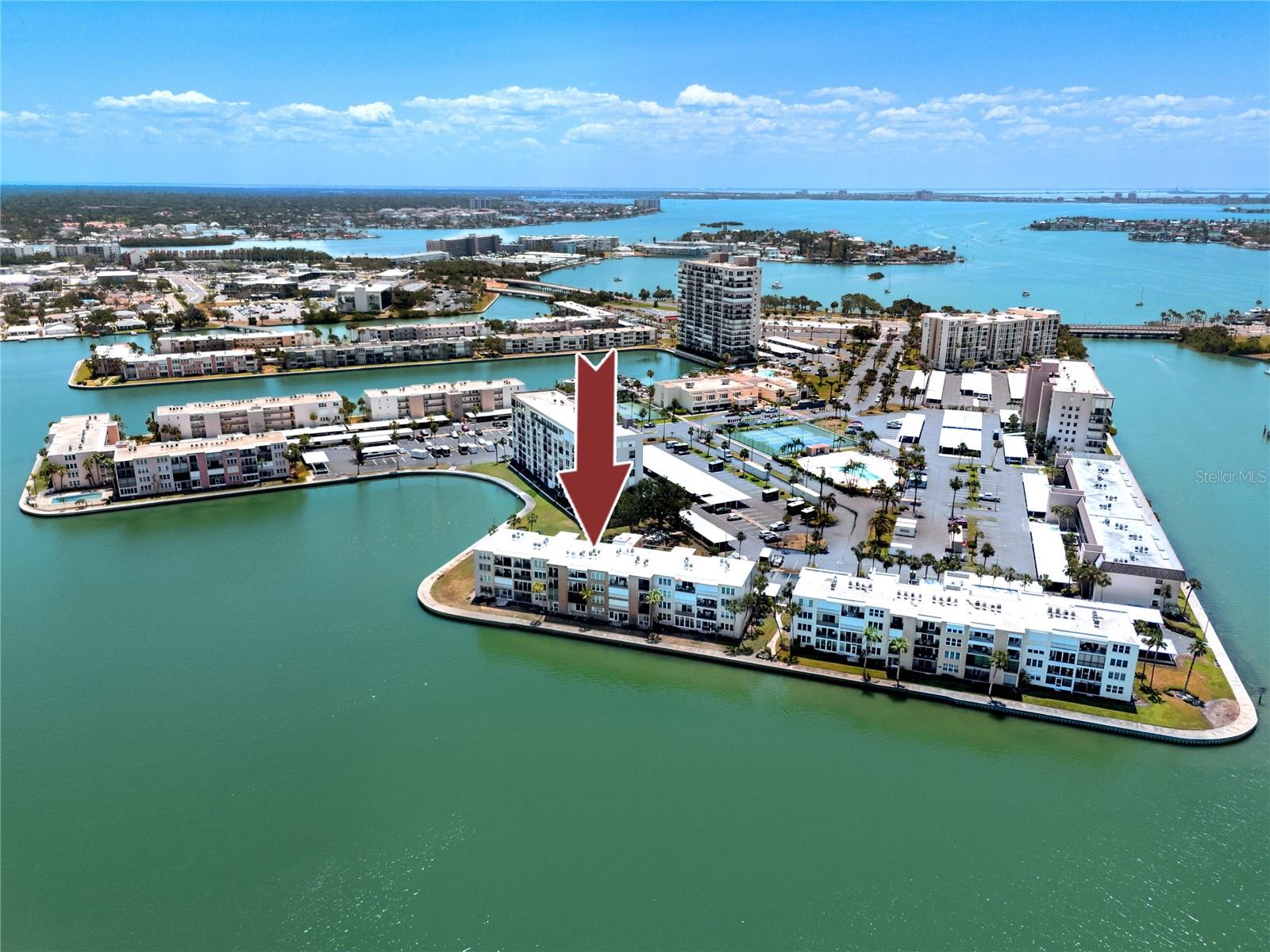 BREATHTAKING BOCA CIEGA DIRECT WATER VIEWS from this 2nd FLOOR FURNISHED CONDO in Bay Island's premier gated 55+ community! PET FRIENDLY ** Enjoy a vibrant lifestyle living on the water in this active and secure community tip 24 hour security and gated access. This 1 BEDROOM, 1 BATH unit is your perfect getaway! It is MOVE-IN READY and completely FURNISHED! ELEVATOR ACCESS * DOG/CAT FRIENDLY * HURRICANE WINDOWS * HURRICANE SLIDERS * Never had water intrusion in this unit from past storms. Enjoy 1 of 6 HEATED POOLS on the Bay Islands Community grounds, gather around the BBQ grills, work out in the gym or take a mile long waterfront walk. MONTHLY FEES REDUCED TO $557 per month! And that includes flood insurance, building insurance, cable, internet, water, trash, amenities including tennis and pickle ball and shuffleboard, library, dock and so much more. Marina on site which offers boat slips when available. COVERED PARKING SPOT #203. Washer and Dryer coin operated machines located on the 4th floor! Plus extra storage locker. Close to St Pete Beach, restaurants, downtown St Pete. Easy access to all Tampa Bay has to offer.