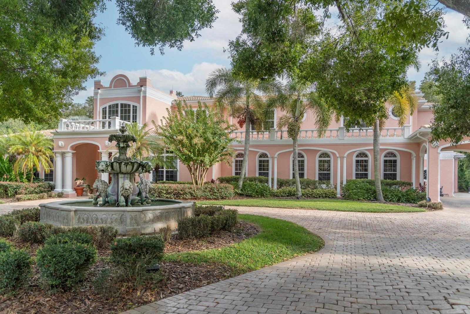 Set behind a stately façade of classic Mediterranean architecture, 543 Isleworth Close presents an exceptional opportunity to own a meticulously refined residence in one of Tarpon Springs’ most distinguished addresses. A harmonious blend of Old World elegance exemplified by the alabaster chandelier and modern sophistication, this home has been thoughtfully enhanced with substantial improvements, ensuring both timeless beauty and contemporary comfort.
The interior unfolds with gracious proportions and carefully curated upgrades throughout. The master suite serves as a private sanctuary, featuring new luxury carpeting in the bedroom and all three custom closets, offering both comfort and understated refinement. A dedicated office, newly carpeted, provides a polished and serene environment for work or study.
Illuminating the home’s architectural detail, new recessed lighting has been installed throughout the interior and exterior, enhancing ambiance while accentuating the home’s refined finishes. All exterior electrical outlets and covers have been replaced, reflecting a commitment to both aesthetics and functionality.
The kitchen, central to both daily living and elegant entertaining, has been refreshed with refinished wood flooring, new paint in the kitchen and pantry, and a suite of new appliances including a stovetop, oven, and microwave. A new washer and dryer complement the home’s modern conveniences, while updated faucets in the butler’s pantry add a subtle note of contemporary luxury.
Designed for elevated entertaining, the residence features a beautifully refreshed game room, with new paint and updated faucets, as well as a professionally refurbished BenQ projector in the theater room, creating an immersive private cinema experience. The Jack and Jill bedrooms and adjoining bath have been tastefully refurbished, offering refined accommodations for family or guests.
Significant capital improvements further enhance the home’s value and longevity, including beautiful one-of-a-kind Brazilian Oak doors throughout, a new barrel tile roof, true to the Mediterranean aesthetic, and a new gas water heater added in 2025. Additional enhancements include fresh paint and ceiling lighting in the laundry room, refinished wood flooring in the family room, a complete home sound system, gas heated pool and spa and window replacement throughout the home, ensuring the home continues to meet the highest standards.
With its commanding Mediterranean presence (one of a kind in its community), extensive upgrades, and attention to detail throughout, 543 Isleworth Close stands as a residence of distinction—offering an elevated lifestyle defined by elegance, comfort, and enduring quality.