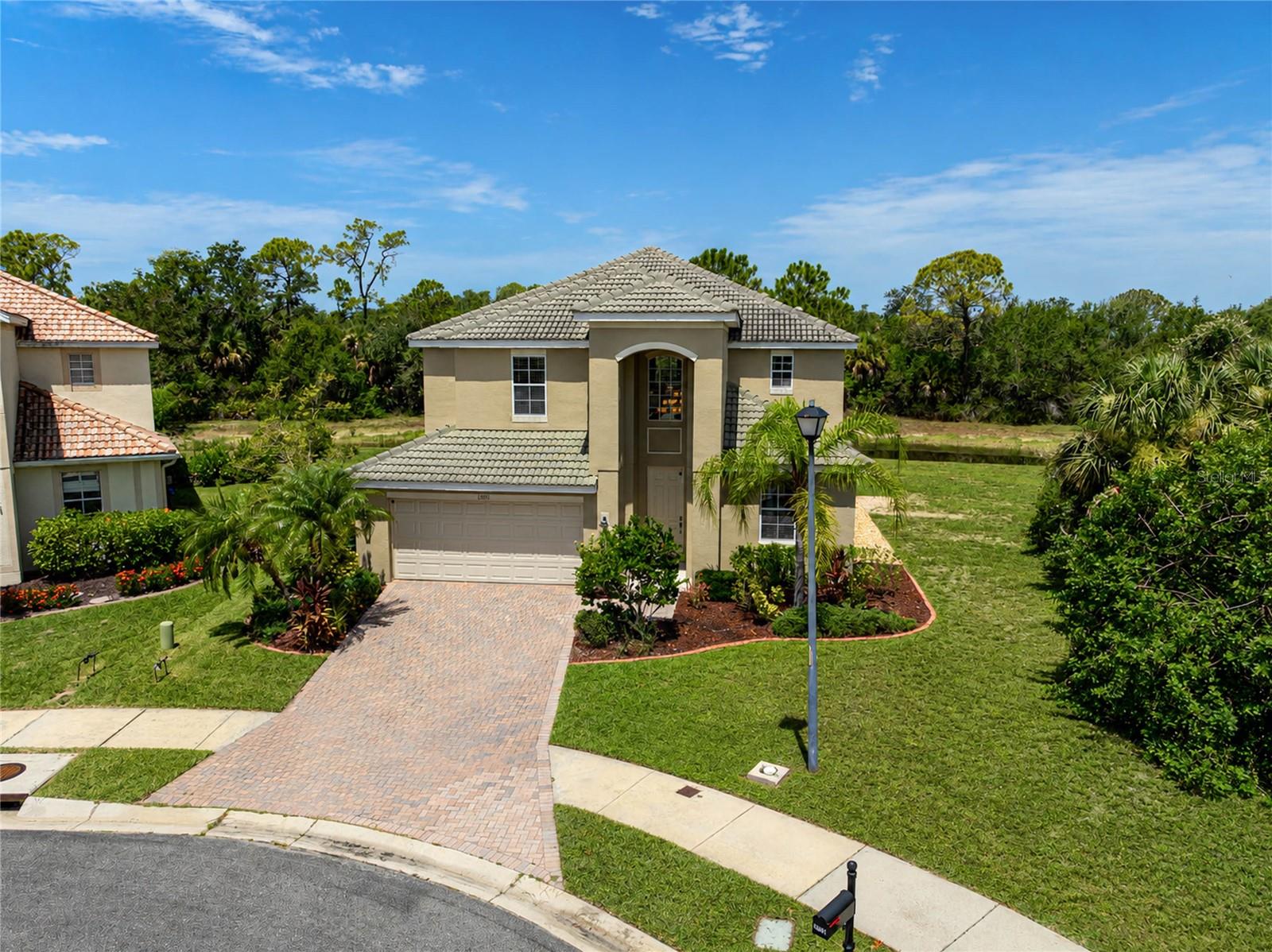 Discover your perfect family retreat in the sought-after gated Stoneybrook at Venice community! This inviting Monte Carlo manor home boasts over 3,200 sq. ft. of living space featuring five generous bedrooms, a loft, versatile bonus room, three full baths, and a 3-car garage.
Nestled on a desirable cul-de-sac lot, savor the privacy and sweeping views of the pool, lake, and preserve — an everyday escape for relaxing, entertaining, or enjoying Florida’s beautiful wildlife. The heart of the home is the gourmet kitchen with stainless steel appliances and granite countertops, while the screened lanai, heated pool, and spa deliver year-round outdoor enjoyment.
The flexible bonus room easily transforms into a theatre or lively game room for the kids — creating the ultimate space for family gatherings and unforgettable memories. Additional upgrades include a paver driveway.
Stoneybrook at Venice offers an active resort lifestyle with a grand clubhouse and indoor theater, resort-style pool and children’s splash pool, fitness center, lighted tennis and pickleball courts, basketball, inline skating rink, sand volleyball, sports fields, playgrounds, and peaceful walking trails weaving around lakes and preserves. With frequent community events, this family-friendly gated neighborhood puts you close to Venice beaches, dining, shopping, and excellent schools.