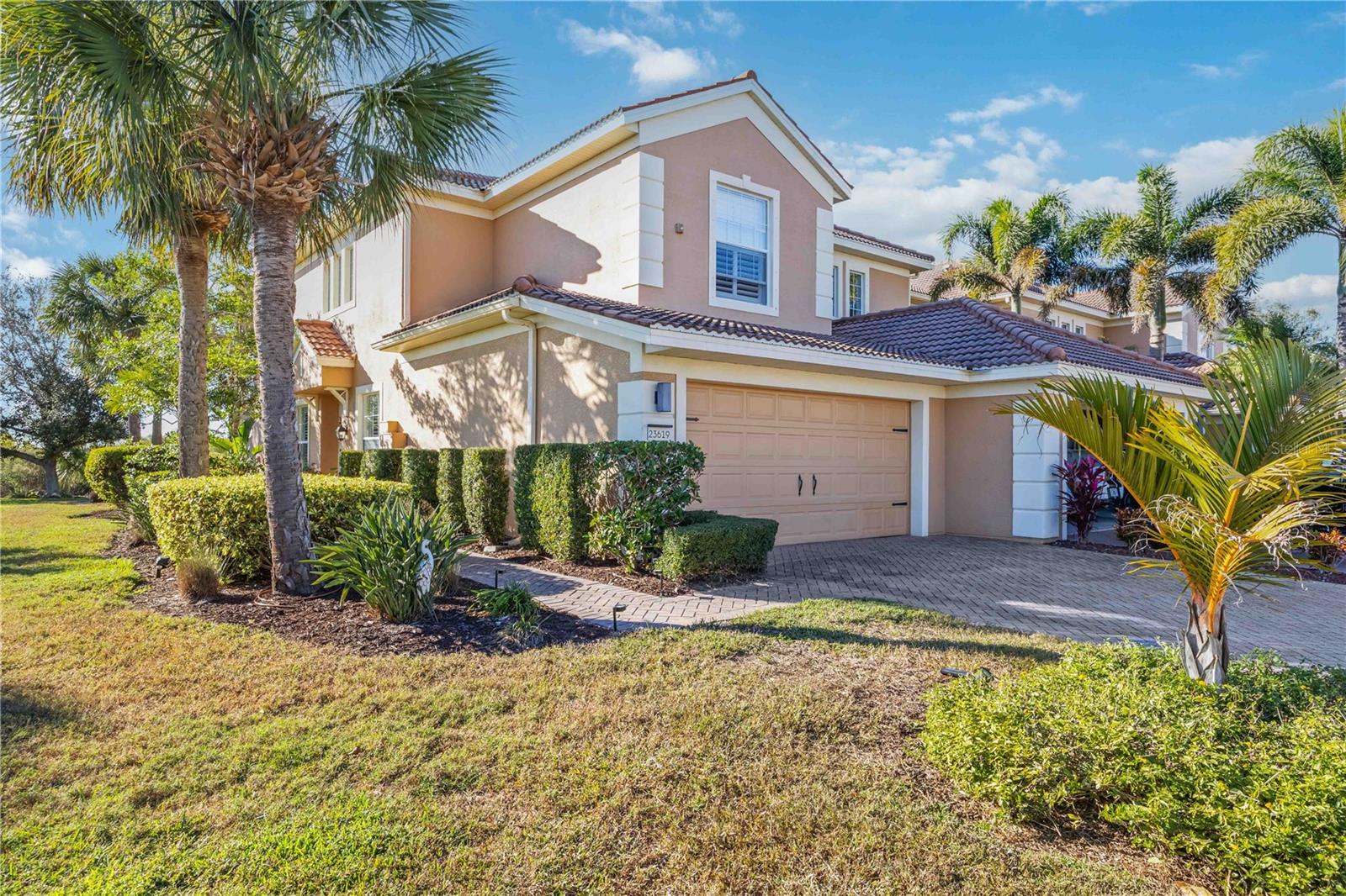 Discover refined Florida living at 23619 Awabuki Drive in the highly sought-after, guard-gated community of Sarasota National. This expansive condo home offers over 2,300 sq. ft. under air and more than 3,100 sq. ft. of total living space, featuring 2 spacious bedrooms, a versatile den (perfect for an office or third bedroom), and an open, light-filled floor plan designed for both everyday comfort and entertaining. An exceptional value, this property includes two golf memberships with the purchase—no additional buy-in—granting access to Sarasota National’s championship 18-hole golf course, pro shop, and club facilities. Residents of Sarasota National enjoy resort-style amenities, including a clubhouse with dining, resort-style pool with lap lanes, poolside Tiki bar, fitness center, tennis, pickleball, bocce, and miles of sidewalks and bike paths. As an Audubon International Certified Signature Sanctuary, Sarasota National is thoughtfully designed to preserve native wildlife and natural habitats, offering tranquil lakes, nature preserves, and abundant birdlife throughout the community. All of this is just a short drive from Venice beaches, historic downtown Venice, Wellen Park, and everyday conveniences—making 23619 Awabuki Drive an ideal blend of luxury, lifestyle, and nature.