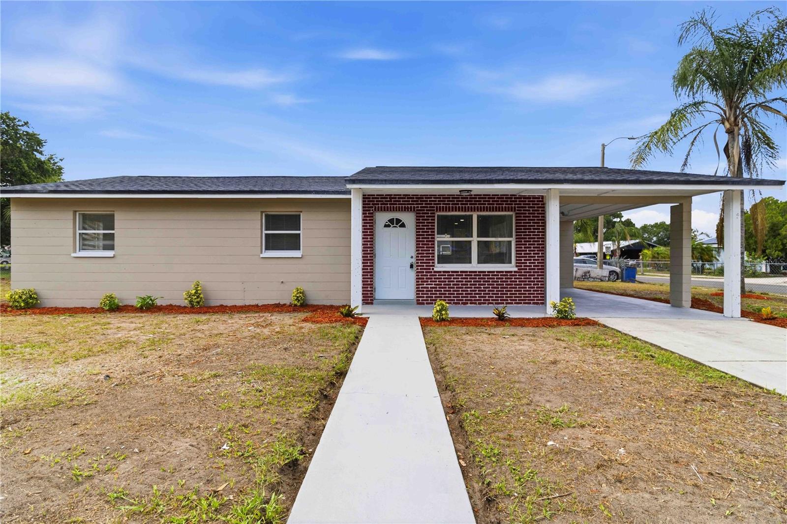 Fully remodeled and move-in ready!!! This gorgeous 3-bedroom, 2-bath Corner Lot home offers modern style, major upgrades, and peace of mind! From the moment you arrive, you’ll appreciate the fresh exterior updates, spacious fenced yard, covered carport, and inviting curb appeal. Inside, the home features a bright open-concept layout designed for comfortable everyday living and effortless entertaining.

The beautifully redesigned kitchen is the centerpiece of the home, showcasing brand-new cabinetry, sleek countertops, stainless steel appliances, a large center island, modern lighting, and abundant cabinet space. Luxury vinyl plank flooring flows throughout the home, complemented by modern recessed lighting with adjustable brightness settings, and contemporary finishes that create a clean, modern feel from room to room.

Both bathrooms feature stylish modern finishes, updated vanities, contemporary tile work, and upgraded fixtures. The primary bathroom includes a beautifully tiled bathtub/shower combination, while the second bathroom offers a spacious walk-in shower with elegant finishes. 

Major improvements include a new roof, new A/C system, new ductwork, new electric water heater, updated electrical and plumbing fixtures, and more — making this home truly turnkey.

Enjoy the convenience of public sewer and city water — no well or septic to maintain! The fenced yard offers plenty of space for pets, gatherings, or future outdoor additions, while the covered carport and extended driveway provide ample parking.

Conveniently located near schools, shopping, dining, and downtown Arcadia, this beautifully upgraded home combines modern comfort, functionality, and value all in one package. Plus, enjoy the added bonus of a park located directly across the street, providing extra green space and recreational convenience right outside your door. Don’t miss your opportunity to own this like-new home — schedule your private showing today!