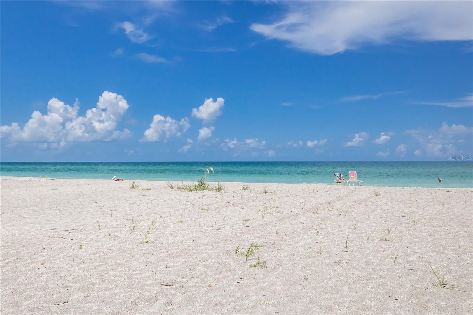 Wake up to sweeping direct Gulf views and step straight onto the sand from this beautifully renovated 2-bedroom, 2-bath condo located on the highly desirable South End. This ground-level residence offers the rare convenience of no stairs, making beach access effortless and everyday living easy.

Thoughtfully updated with a light, coastal aesthetic, the condo features an open and inviting layout designed to maximize both comfort and views. The living and dining areas flow seamlessly toward the Gulf-facing windows, where sunsets become part of your daily routine. The renovated kitchen and baths ave modern finishes while maintaining a relaxed, beachside feel. Both bedrooms are well-proportioned, providing privacy for owners and guests alike.

In addition to being an exceptional personal retreat, this property is a strong rental producer, offering excellent income potential in one of the area’s most sought-after locations. Its proximity to the Village of Boca Grande allows for quick access to charming shops, renowned dining, and local events—perfectly reachable by bike or golf cart.

The community enhances the coastal lifestyle with a sparkling pool, community grills ideal for outdoor gatherings, and dedicated parking with golf cart charging stations. Whether you’re hosting friends, enjoying quiet mornings by the water, or capitalizing on rental demand, this condo delivers versatility and value.

Combining direct Gulf-front access, modern updates, and an unbeatable South End location, this property is a rare opportunity to own a turnkey beachfront condo that truly captures the essence of Boca Grande living.