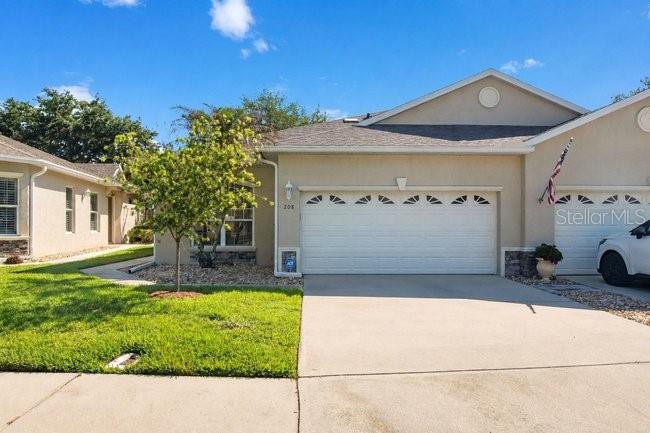One or more photo(s) has been virtually staged. Step into effortless Florida living in this beautifully maintained 2-bedroom, 2-bath half-duplex offering 1,766 sq. ft. of open, bright living space with water views. Located in a desirable gated golf community, this home blends comfort, convenience, and style. Enjoy peace of mind with a new roof (2019) and a tankless water heater, plus easy living with lawn maintenance included. The spacious closed-in lanai extends your living area—perfect for morning coffee or evening relaxation overlooking the water. Inside, you’ll find tile flooring throughout, a large master ensuite, and a modern kitchen that includes all appliances. This community is golf cart friendly, making it easy to explore nearby amenities or hit the course at your leisure. With a 2-car garage, an inviting layout, and meticulous upkeep, this home truly checks every box for low-maintenance living in a serene setting. Don’t wait, schedule your private showing today and experience the perfect blend of comfort and lifestyle this home offers!