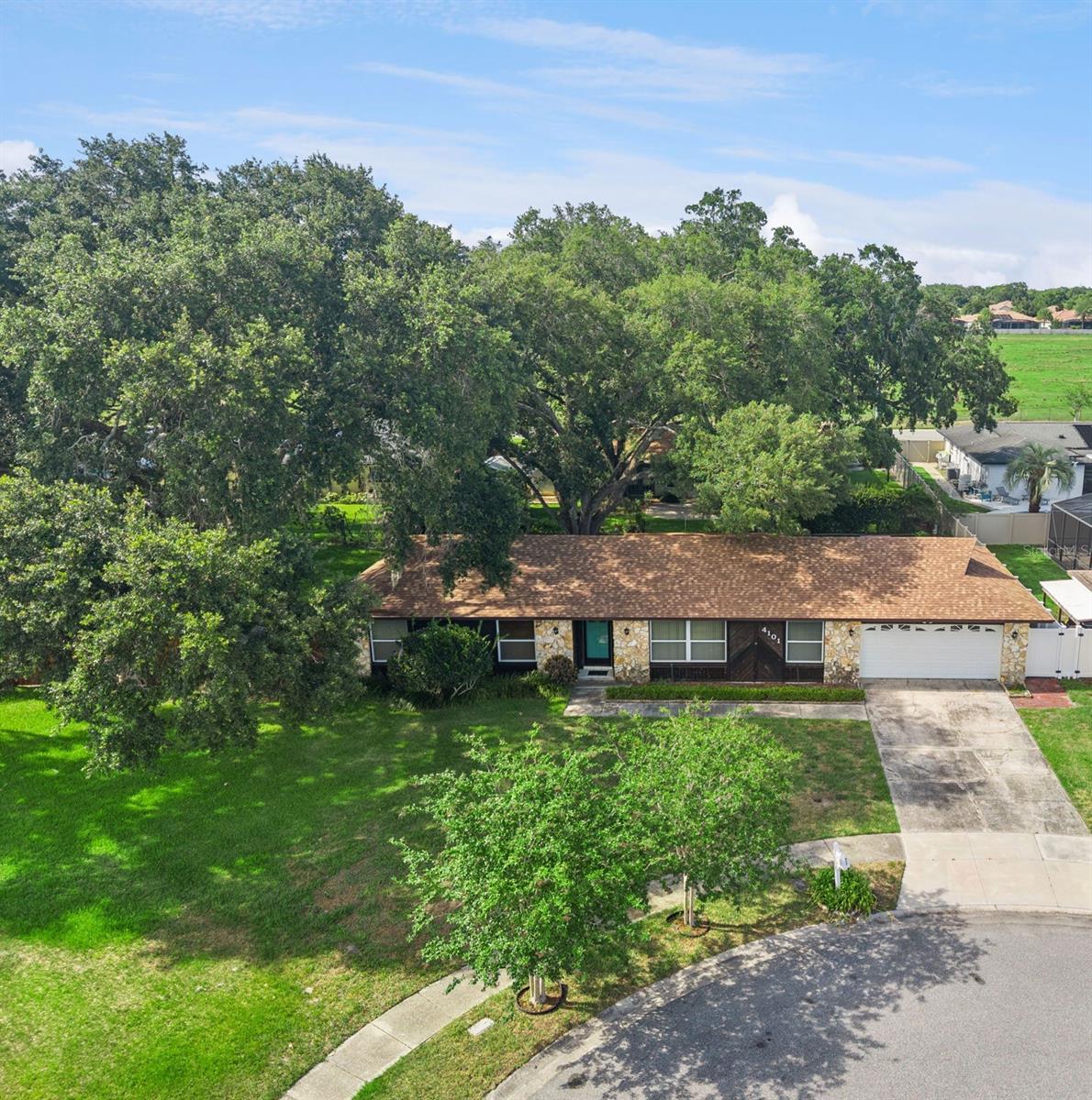 Located in the highly desirable Belle Isle community, this 4-bedroom, 2-bath home offers flexibility, updates, and access to the Florida lake lifestyle! Situated in the established Conway East neighborhood, the home is located at the end of a friendly cul-de-sac on an oversized lot with extra room for outdoor living and storage.

Known for its tree-lined streets, community feel, and access to the renowned Lake Conway chain of lakes, Belle Isle remains one of Central Florida’s most desirable areas — conveniently located just minutes from downtown Orlando, Orlando International Airport, shopping, dining, and major roadways.

Inside, the versatile floor plan includes a flexible 4th bedroom that can easily function as a home office, den, or playroom. The kitchen features a large breakfast bar that opens to the main living areas, making it ideal for entertaining and everyday living. The home includes a primary shower with updated tile, while the second bathroom has been completely refreshed with tile in bath, tiled flooring, and  vanity, and the screened-enclosed patio provides additional space to relax or gather with friends and family

The oversized lot also offers room to park an RV, boat, or additional recreational vehicles behind the wooden privacy fence with gated access. Optional HOA membership is only $100 annually and includes access to the Conway East community lake lot and private boat ramp on Lake Conway — perfect for boating, fishing, skiing, and enjoying waterfront recreation year-round.

Additional highlights include a new roof installed in 2024, replacement windows approximately 10 years ago, and an oversized 2-car garage.