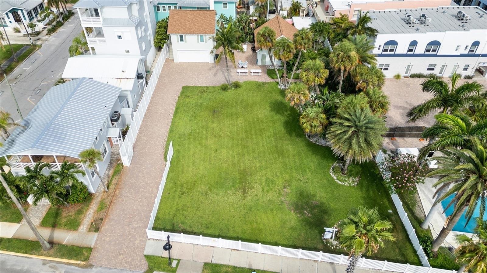 Experience the ultimate in coastal living and investment potential with this charming 644-square-foot home in Historic Pass-A-Grille. Currently operating as an income-producing short-term rental, this one-bedroom, one-bathroom property offers not only immediate returns but also unmatched future value.

Located at 702 Pass-A-Grille Way, the true opportunity lies in its redevelopment potential. Zoned to accommodate up to 17 multifamily units, this expansive lot is directly across from the serene Intracoastal Waterway and just a 45-second walk to the world-renowned Pass-A-Grille Beach, consistently ranked among the best beaches in the country and the world.

Beyond the stunning waterfront views, you’re steps from 8th Avenue — celebrated as "the shortest Main Street in America flanked by water." Here, charming local restaurants, boutique shops, and the iconic Merry Pier offer an authentic taste of beachside living.

For city amenities, downtown St. Petersburg is a quick drive away, featuring vibrant arts, award-winning dining, and thrilling sports events with the Tampa Bay Rays, Rowdies, and Lightning. Tampa International Airport is conveniently located just 35 minutes away, providing seamless access for vacationers and frequent travelers alike.

Whether you're looking to continue generating rental income or unlock the property's full potential with a lucrative redevelopment project, this Pass-A-Grille gem presents an extraordinary opportunity to own a piece of Florida's beloved Gulf Coast.