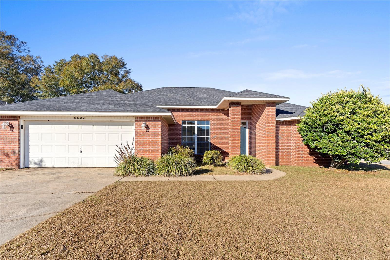 Flexible living meets long-term upside in one of Pensacola’s steadily growing corridors.

Positioned in Pensacola with convenient access to major roadways, this home benefits from continued residential and commercial growth throughout the area, including expanding retail, infrastructure improvements, and sustained demand driven by nearby employers and military installations.

Just a short drive puts you at some of the Gulf Coast’s most desirable destinations—**Pensacola Beach for world-class white sand and water, and vibrant **Palafox Street downtown known for dining, shopping, and local events. The location also offers convenient access to major bases including Naval Air Station Pensacola, Corry Station, and NAS Whiting Field, supporting long-term housing demand in the region.

Inside, the home stands out with a highly functional and flexible layout designed for modern living.

A fully enclosed Florida Room lined with windows provides a bright secondary living area, perfect for relaxing, entertaining, or workspace use. The primary suite features a private sliding door leading directly into this space, creating a seamless extension of the home.

The living area includes a fireplace (condition not warranted), adding character and a natural focal point.

One of the most valuable features is the private in-law style suite—a bedroom with its own exterior entrance and en-suite bathroom, offering ideal separation for guests, extended family, or flexible living arrangements.

An additional shared bathroom also includes direct exterior access, a practical feature for outdoor use, entertaining, or day-to-day functionality.

The garage has been partially converted into conditioned living space (not warranted as permitted), complete with HVAC and a closet, providing a versatile bonus area suitable for a bedroom, office, gym, or additional living space. A portion of the garage remains available for dedicated storage, maintaining functionality while expanding usable space.

The backyard extends usability further with an additional open patio area, complementing the enclosed Florida Room and enhancing indoor-outdoor living.

This property offers more than just square footage—it delivers multiple living zones, private entrances, and flexible use potential in a market where adaptability is increasingly valuable.

Opportunities with this level of flexibility and location do not last. Seller will make decision by 7/15/26.