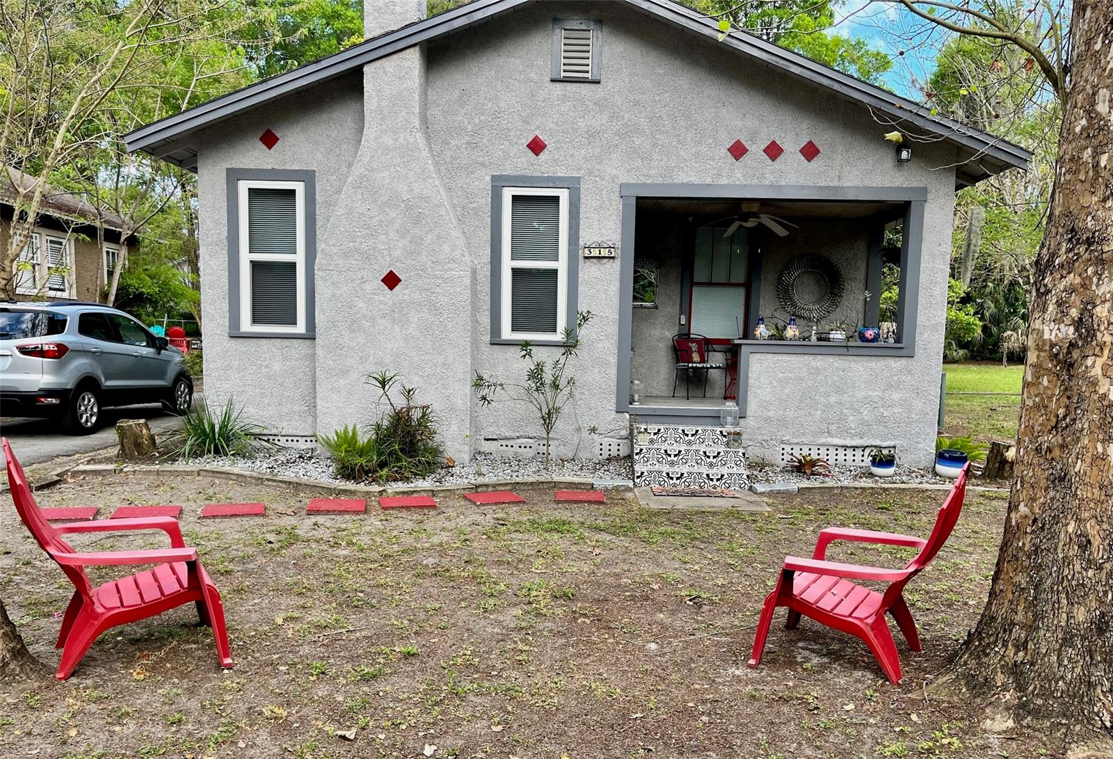 Cute Bungalow 3 bedroom 1 bathroom in the historic town of Deland!!  HUGE yard only half of it is fenced in, with a one car detached garage. Lots of improvements were done in this cute home, refurbished floors back to original hardwood floors, updated the bathroom with a nice walk in shower with a gorgeous barn door, painted the entire home inside and out, new flooring in the kitchen and bonus / flex 3rd bedroom, new lighting fixtures through out, new kitchen appliances and washer & dryer , kitchen  was renovated with wood paneled cabinetry with corian counter tops, roof was replaced in 2014. Some furniture items stay with the house along with a back yard jacuzzi!!  Excellent location with walking distance to Stetson University and downtown shopping!!  All information is deemed accurate but not guaranteed.
