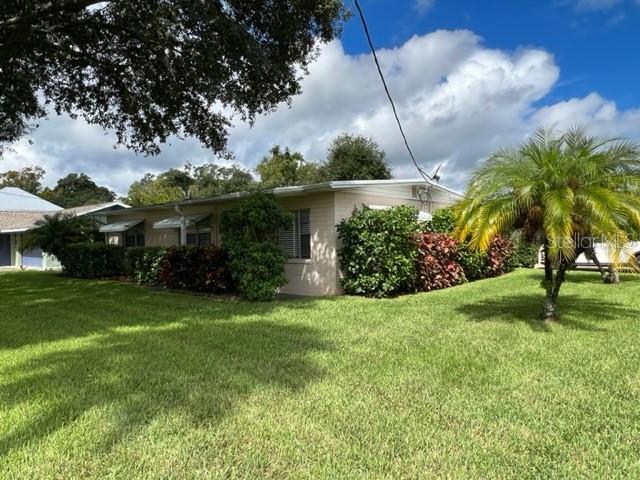 PERFECT and AFFORDABLE opportunity for a First time home buyer or make this a new investment to add to your portfolio!  Come enjoy this three-bedroom, one bath home centrally located in New Smyrna Beach close to shopping, dining, and schools.  Freshly painted interior, original terrazzo floors throughout, and new bathroom vanity.  Situated on a nicely landscaped 80 X 130 fenced in corner lot.  2018 HVAC system.  This home has been hurricane tested and did not flood during the storms of 2022!  Come home to 701 Wayne Avenue and add the final touches to make it yours! ;Water: City