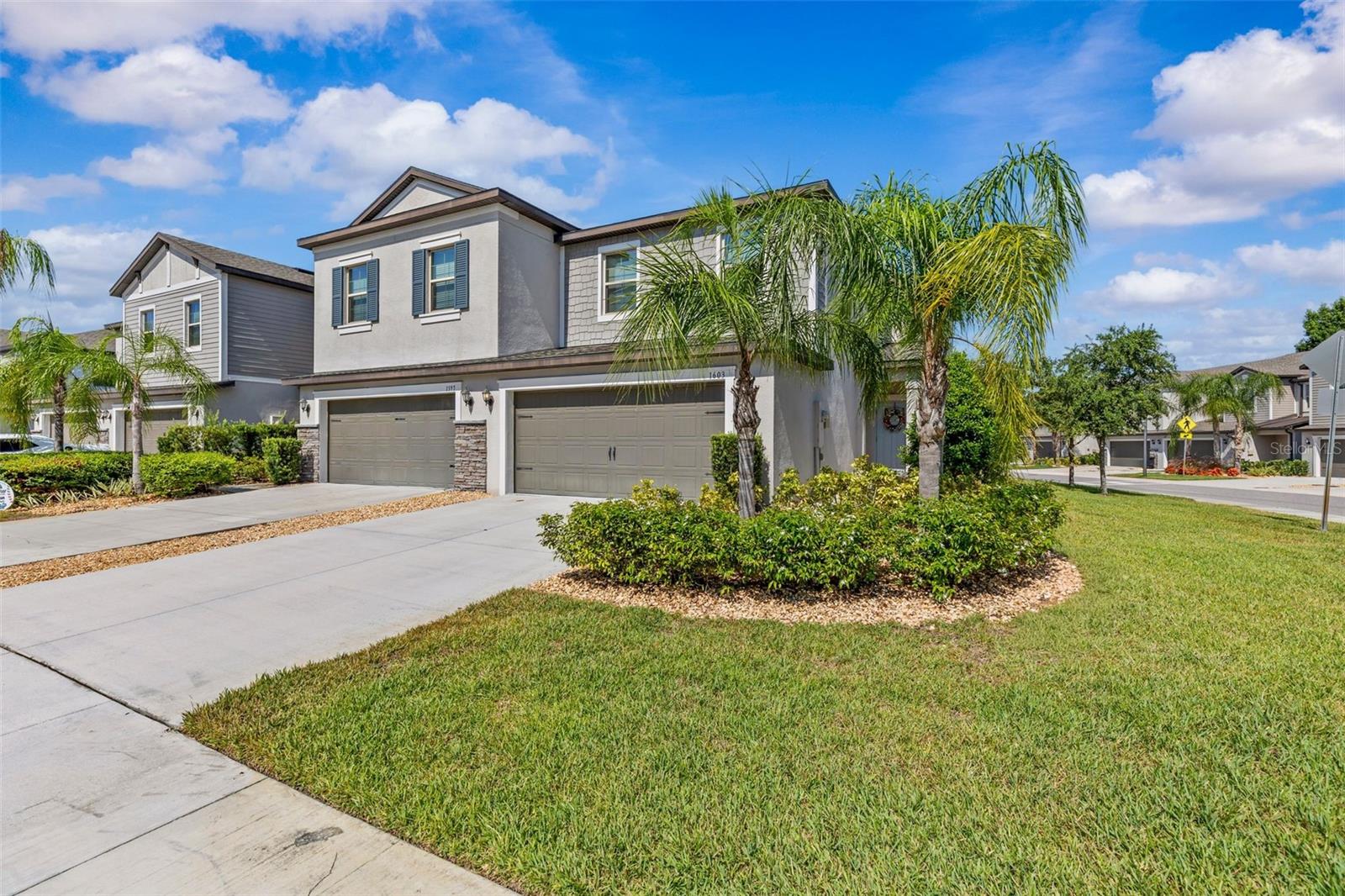 Welcome to this beautifully maintained end-unit townhome located in the highly sought-after gated community of Willow Square. Offering 1,801 square feet of thoughtfully designed living space, this 3-bedroom, 2.5-bath residence combines comfort, style, and low-maintenance living. As an end unit, the home is filled with an abundance of natural light thanks to the additional windows that create a bright and inviting atmosphere throughout the main living areas. As you enter through the front door, you'll step inside the welcoming foyer and discover an open-concept floor plan where the spacious living room flows seamlessly into the dining area and well-appointed kitchen, making it ideal for both everyday living and entertaining. Elegant crown molding and ceramic tile flooring enhance the entire first level, while a convenient half bath is perfectly situated for guests. The kitchen is designed to impress with granite countertops, stainless steel appliances, 42-inch upper cabinets, lower cabinets featuring convenient pull-out shelves, and a combined pantry/laundry room complete with custom built-in shelving for exceptional organization. Upstairs, a versatile loft separates the split-bedroom floor plan, offering additional living space perfect for a home office, media area, or reading nook. The spacious primary suite is filled with natural light and features an ensuite bathroom with dual granite vanities, a walk-in shower, relaxing garden tub, and a generous walk-in closet. Enjoy peaceful mornings on the screened lanai overlooking the backyard—the perfect place to watch the sunrise while enjoying your morning coffee. The two-car garage features an attractive epoxy floor finish, complemented by an extended driveway and convenient guest parking nearby. Enjoy worry-free living with low HOA fees that include lawn and landscaping maintenance, exterior maintenance, and the roof. Even better, there is no CDD fee. Residents of Willow Square enjoy a resort-style community pool. Conveniently located just minutes from I-75 and I-275, this home is close to shopping, dining, medical facilities, and everyday conveniences, while being zoned for top-rated schools. This exceptional townhome offers the perfect blend of location, convenience, and low-maintenance Florida living. Don't miss your opportunity to own this exceptional home in one of the area's most desirable gated communities. Schedule your private showing today and experience everything this beautiful townhome has to offer! **The seller is willing to include select furnishings with an acceptable offer, providing an exceptional move-in-ready opportunity for the next owner.**Ask about EXCLUSIVE FINANCING INCENTIVES available to qualified buyers. Buyer is not required to use the preferred lender.