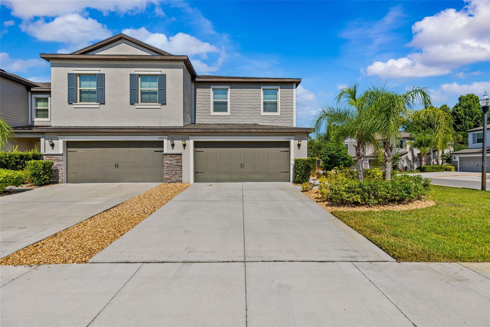 Welcome to this beautifully maintained end-unit townhome located in the highly sought-after gated community of Willow Square. Offering 1,801 square feet of thoughtfully designed living space, this 3-bedroom, 2.5-bath residence combines comfort, style, and low-maintenance living. As an end unit, the home is filled with an abundance of natural light thanks to the additional windows that create a bright and inviting atmosphere throughout the main living areas. As you enter through the front door, you'll step inside the welcoming foyer and discover an open-concept floor plan where the spacious living room flows seamlessly into the dining area and well-appointed kitchen, making it ideal for both everyday living and entertaining. Elegant crown molding and ceramic tile flooring enhance the entire first level, while a convenient half bath is perfectly situated for guests. The kitchen is designed to impress with granite countertops, stainless steel appliances, 42-inch upper cabinets, lower cabinets featuring convenient pull-out shelves, and a combined pantry/laundry room complete with custom built-in shelving for exceptional organization. Upstairs, a versatile loft separates the split-bedroom floor plan, offering additional living space perfect for a home office, media area, or reading nook. The spacious primary suite is filled with natural light and features an ensuite bathroom with dual granite vanities, a walk-in shower, relaxing garden tub, and a generous walk-in closet. Enjoy peaceful mornings on the screened lanai overlooking the backyard—the perfect place to watch the sunrise while enjoying your morning coffee. The two-car garage features an attractive epoxy floor finish, complemented by an extended driveway and convenient guest parking nearby. Enjoy worry-free living with low HOA fees that include lawn and landscaping maintenance, exterior maintenance, and the roof. Even better, there is no CDD fee. Residents of Willow Square enjoy a resort-style community pool. Conveniently located just minutes from I-75 and I-275, this home is close to shopping, dining, medical facilities, and everyday conveniences, while being zoned for top-rated schools. This exceptional townhome offers the perfect blend of location, convenience, and low-maintenance Florida living. Don't miss your opportunity to own this exceptional home in one of the area's most desirable gated communities. Schedule your private showing today and experience everything this beautiful townhome has to offer! **The seller is willing to include select furnishings with an acceptable offer, providing an exceptional move-in-ready opportunity for the next owner.**Ask about EXCLUSIVE FINANCING INCENTIVES available to qualified buyers. Buyer is not required to use the preferred lender.