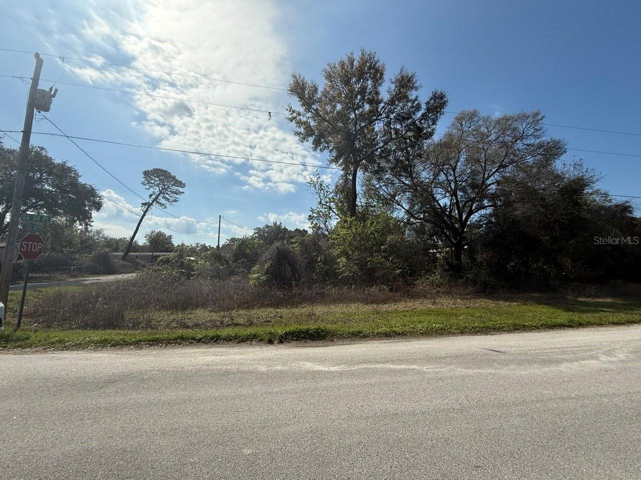 0.23 acres corner lot located in Ocklawaha, Florida. A current survey is available, and the environmental review indicates no wetlands on the property. Ideal for buyers seeking a recreational or residential opportunity with access to boating, fishing, and kayaking. Ocklawaha is a hidden gem in Florida, surrounded by beautiful nature and friendly communities. It’s a place where you can escape the hustle and bustle of city life and connect with nature. Whether you're looking for a weekend getaway or a permanent home, this land is the perfect choice! Don’t wait too long! Opportunities like this don’t come around every day. Own a piece of paradise in Ocklawaha and create memories that will last a lifetime. Learn more about this incredible property! This property is part of a 7-parcel portfolio. Contact us to get more information on combo pricing. Buyer and Buyer’s Agent to independently verify all information deemed material, including zoning, building requirements, utilities, setbacks, and development feasibility.