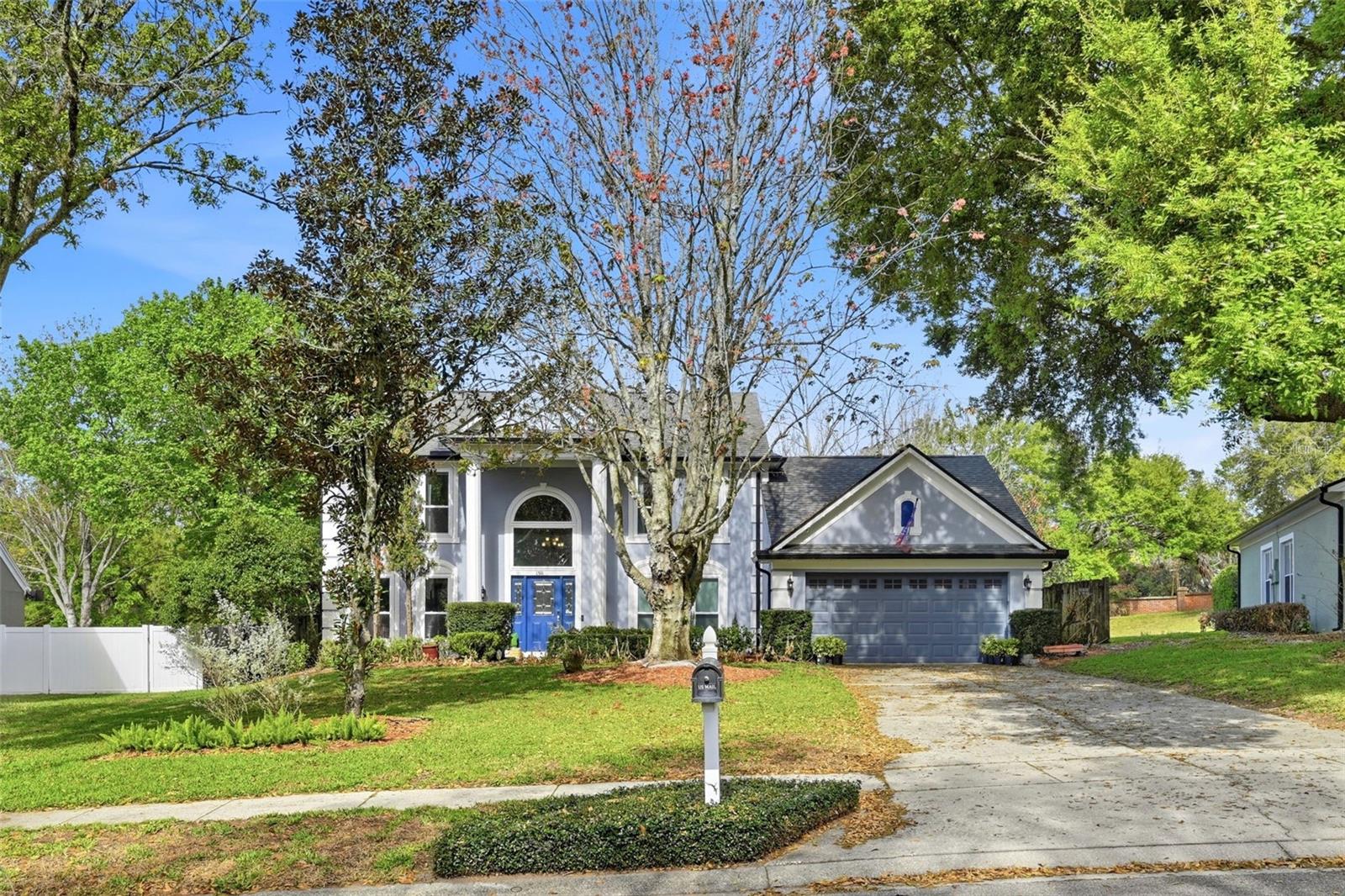 AMAZING OPPORTUNITY — Welcome to this beautifully maintained pool home in the lakefront community of Lake Olympia North Village. Situated on an oversized lot, this spacious two-story residence offers 3 bedrooms (with office space that could be used as a 4th bedroom), 2.5 bathrooms, and over 2,300 square feet of living space, blending comfort, functionality, and timeless style. From the moment you arrive, the home impresses with its grand two-story entry and large arched window, filling the foyer with natural light. The formal dining room features attractive wood flooring and upgraded windows, creating an elegant space for entertaining. A dedicated home office tucked off the living room (currently being used as a spacious playroom) provides a great workspace with views of the backyard. The heart of the home is the spacious family room with a cozy wood-burning fireplace, seamlessly connecting to the kitchen and outdoor living areas. The kitchen features granite countertops, wood cabinetry, stainless steel appliances, and a large eat-in nook, making it perfect for both everyday living and hosting guests. Upstairs, all bedrooms are thoughtfully arranged for privacy. The primary suite offers vaulted ceilings, walk-in closet, and a spa-inspired bathroom with double vanity, a jetted soaking tub, and separate shower. Step outside to your private backyard oasis, complete with a covered lanai, expansive paver patio, and sparkling pool—ideal for relaxing or entertaining year-round. The lush landscaping and garden space add to the tranquil outdoor setting. Newer roof (2022), creates peace of mind for the next owner. Conveniently located near shopping, dining, and major highways including SR-429, SR-408, and the Florida Turnpike, this home provides easy access to downtown Orlando, Winter Garden, and Central Florida attractions. This move-in-ready home combines space, privacy, and location—a rare opportunity in this sought-after community.