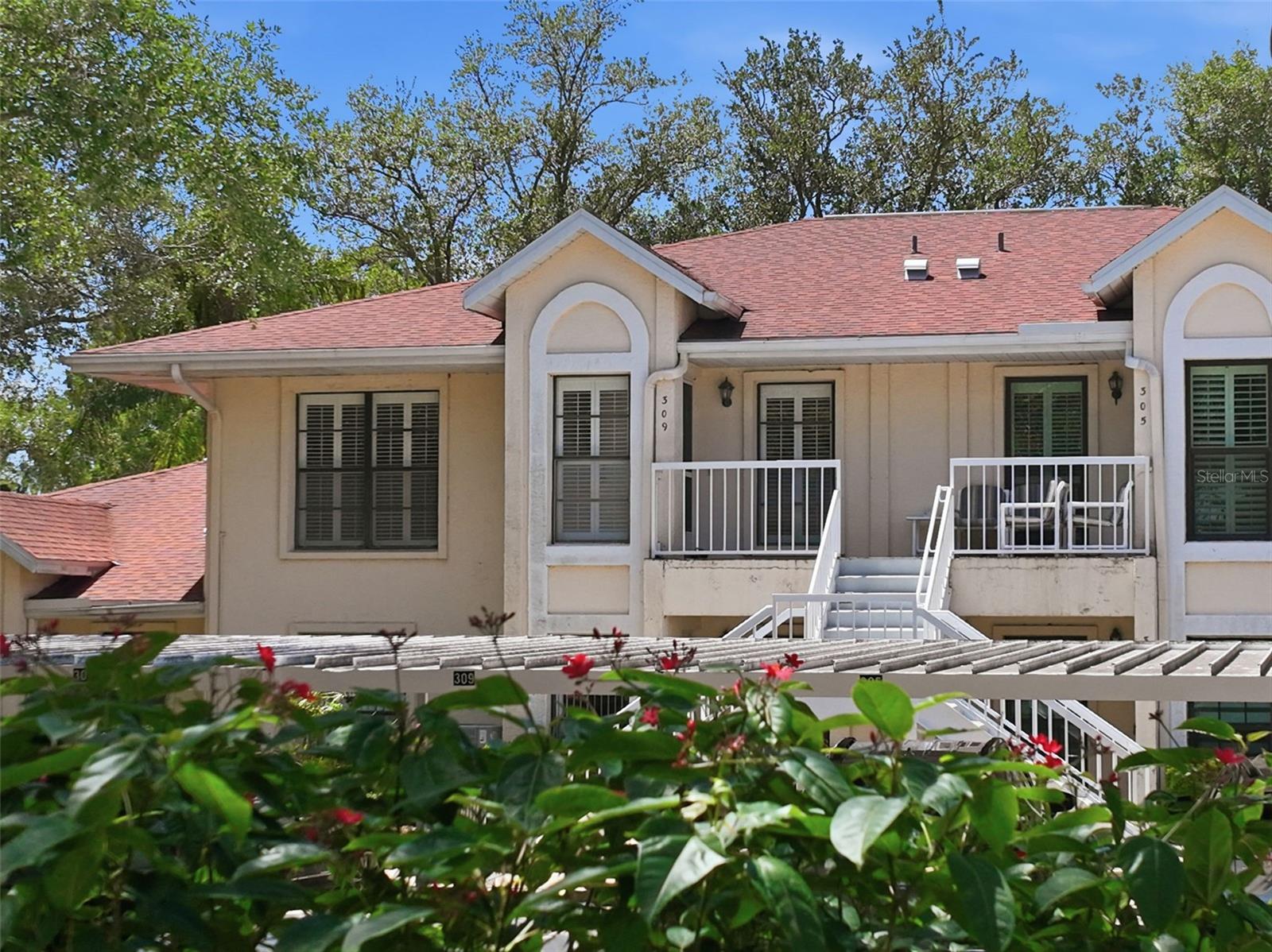 This is not just a home - it’s a lifestyle, it’s low-maintenance living at its finest! Experience sun-drenched living in this impeccable, one owner, maintained 2BR/2BA condo retreat featuring a seamless flow to your private back lanai overlooking “YOUR OWN COMMUNITY POOL". This impeccable home has **AIR CONDITIONER less than 3 years old ** NEWER ELECTRIC CONTROL PANEL ** PLANTATION SHUTTERS THROUGHOUT **MANUAL PULL DOWN SHADE IN BACK LANAI. Your screen-enclosed lanai is the perfect private retreat for morning coffee or evening relaxation. This property is located in the highly sought-after, gated community of Kings Point. The community monthly fees cover roofing, painting, landscaping, cable, internet, water, pest control and many more exterior features available that creates the “lock and leave” lifestyle for seasonal residents or year-round comfort for those seeking the best of 55+ living. Drive your golf cart to friendly access clubhouses, clubs, activities, shopping, dining, grocery stores, medical offices,  hospital, etc., through the many miles of golf cart paths offered throughout this community. This home is designed for worry-free, maintenance-free living so you can enjoy the vibrant social hub of clubs and activities in this value-packed, gated-community, living retreat.