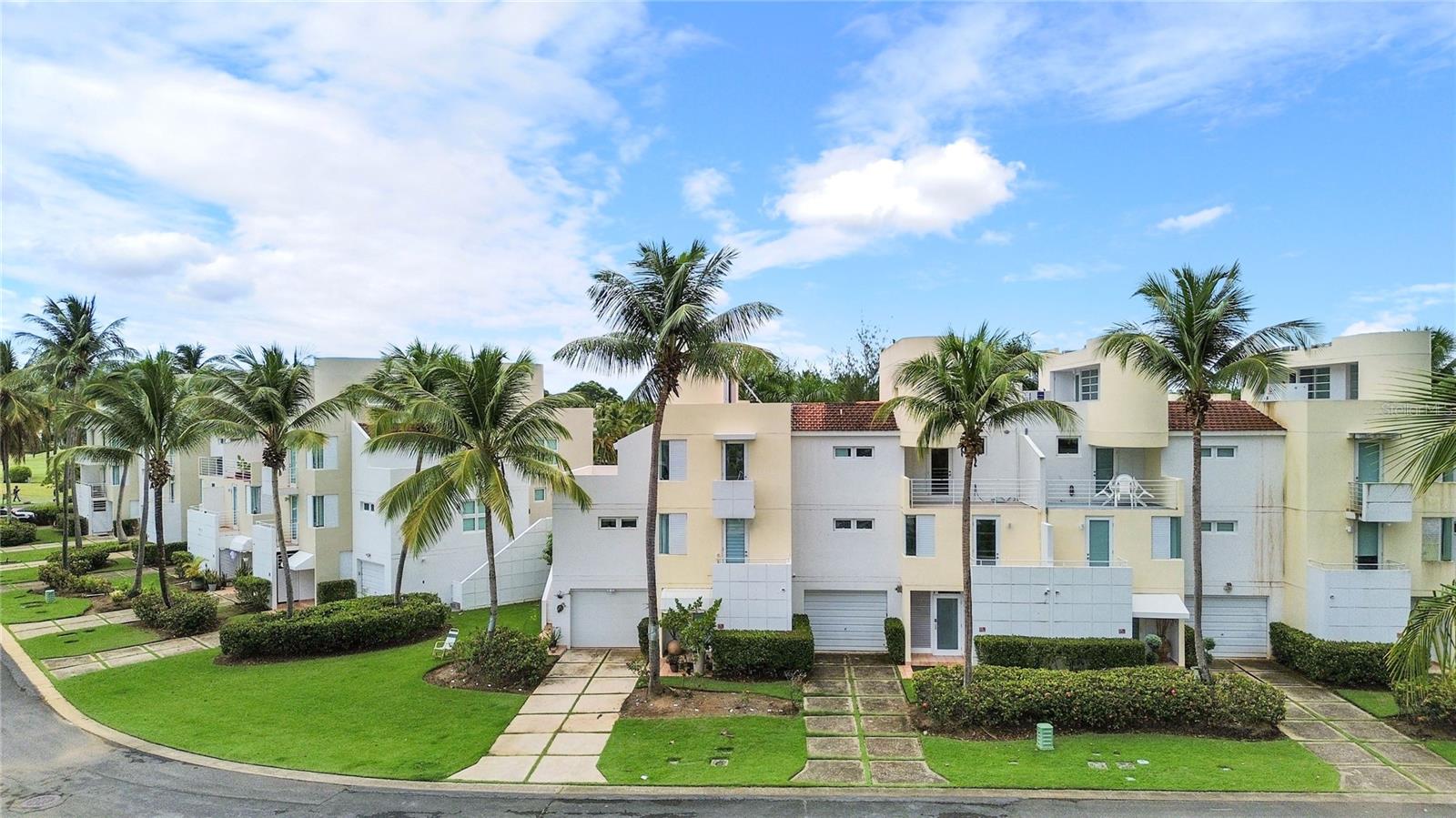 Located in the desirable town of Dorado, this spacious and beautifully maintained four-story residence offers four bedrooms, four and a half bathrooms, three private terraces, and generous living areas designed for comfort and entertaining. Each bedroom features its own ensuite bathroom, providing privacy and convenience for family members and guests alike. Sold fully furnished, this move-in-ready home offers the perfect blend of comfort, functionality, and relaxed resort-style living. The property also includes a full power generator and water cistern, providing peace of mind and uninterrupted comfort year-round.

Situated within the Villas de Golf community at Dorado del Mar, residents enjoy a secure gated environment and access to excellent amenities, including a swimming pool, tennis courts, basketball courts, and a golf course. Just minutes from beautiful beaches, restaurants, shopping, schools, and everyday conveniences, this property presents a wonderful opportunity to enjoy one of Puerto Rico’s most desirable lifestyles.
Monthly HOA: $400, Annual taxes: $3636 aprox., Annual Insurance $5,136. Also available for rent for $4,900.