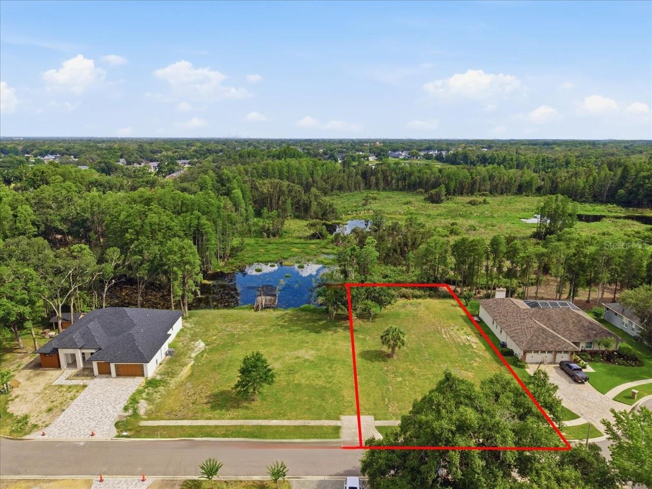 LAKE MAGDALENE WOODS LOT 9 REPLAT - Land