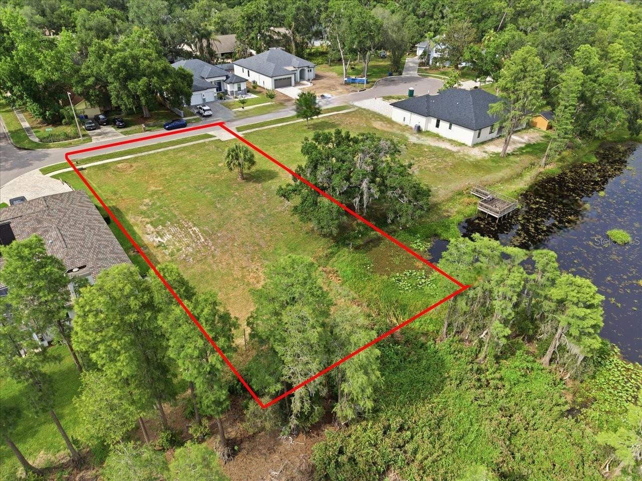 LAKE MAGDALENE WOODS LOT 9 REPLAT - Land