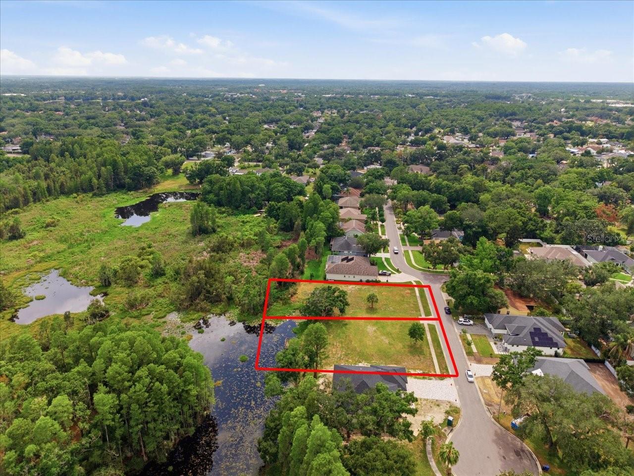 LAKE MAGDALENE WOODS LOT 9 REPLAT - Land