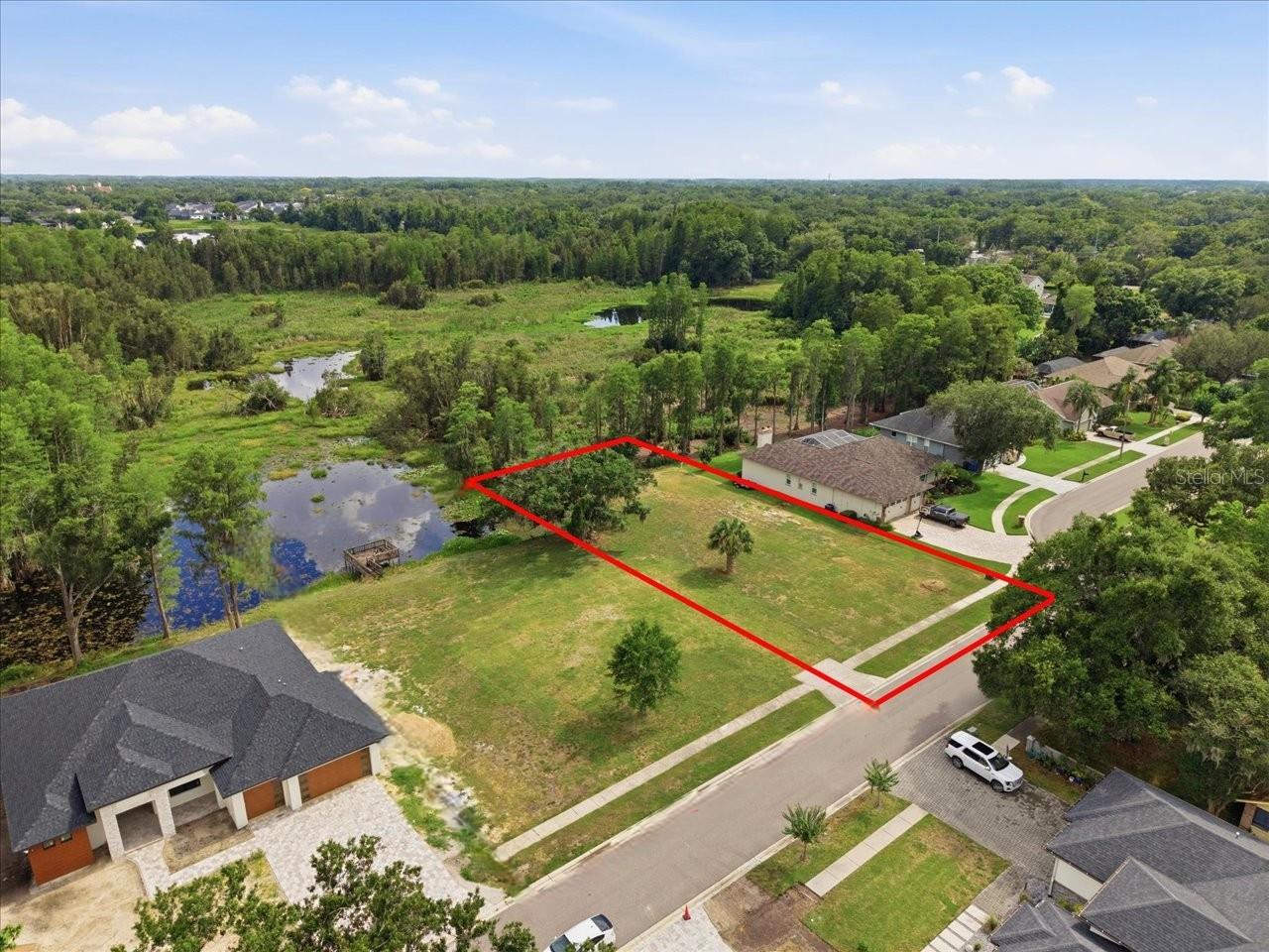 LAKE MAGDALENE WOODS LOT 9 REPLAT - Land