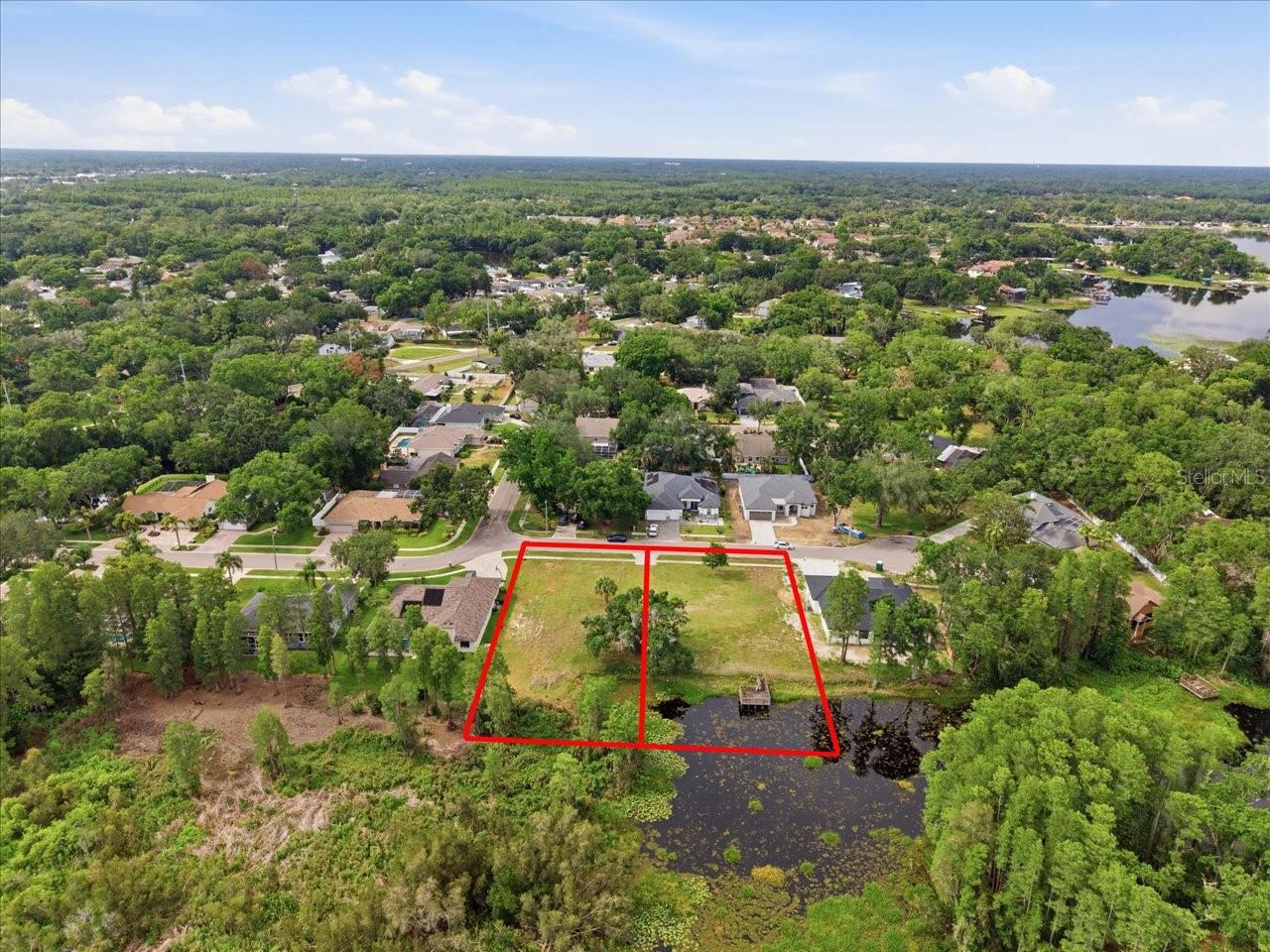 LAKE MAGDALENE WOODS LOT 9 REPLAT - Land