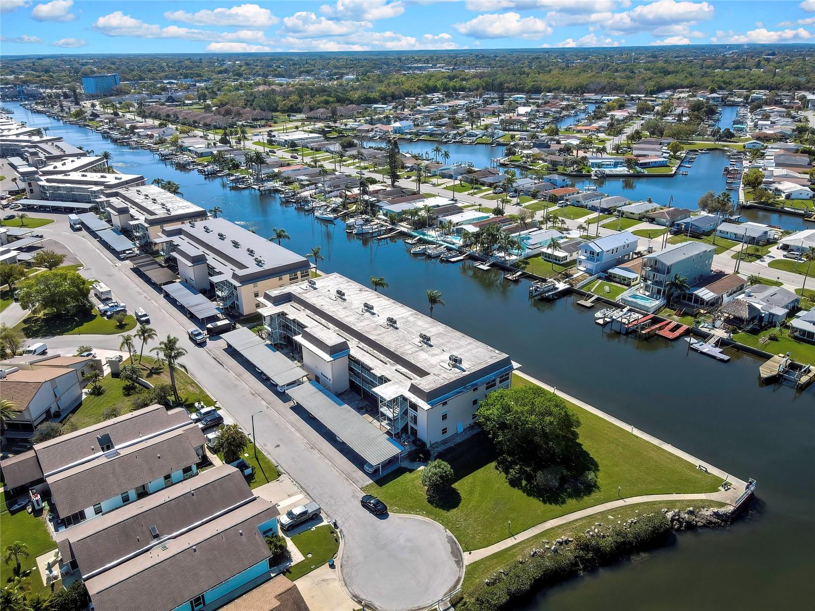 BIG BEAUTIFUL WATERFRONT CONDO LOCATED IN THE DESIRABLE GULF HARBORS COMMUNITY! THIS 2 BEDROOM KNOCKOUT ASLO FEATURES A TREMENDOUS BONUS ROOM WITH STUNNING WATER VIEW THAT COULD EASILY BE USED AS A THIRD BEDROOM. ALSO OFFERING A NICE FULL KITCHEN WITH A FORMAL DINING AREA, AN OVERSIZED LIVING ROOM, AND TILE THROUGHOUT ALL COMMON LIVING AREAS. THIS BIG BEAUTIFUL SECOND FLOOR UNIT IS CONVEIENENTLY LOCATED STEPS FROM THE ELEVATOR  AS WELL  AS THE LAUNDRY FACILITY.  CABLE,TRASH, WATER  . CLUBHOUSE AND  COMMUNITY POOLS ARE INCLUDED IN THE RENT.  AS IF THATS NOT ENNOUGH. TENANTS ARE ELEGIBLE FOR MEMBORSHIP  TO THE NOTORIUOSLY  BEAUTIFUL GULF HARBORS PRIVATE BEACH FOR A SMALL ANNUAL FEE!!!!   CLOSE TO ALL SHOPPING AND DOWNTOWN NEW PORT RICHEY PARKS . RESTAURANTS AND NIGHTLIFE!  JUST 30  MINUTES TO TAMPA AIRPORT AND CLEARWATER BEACHS!