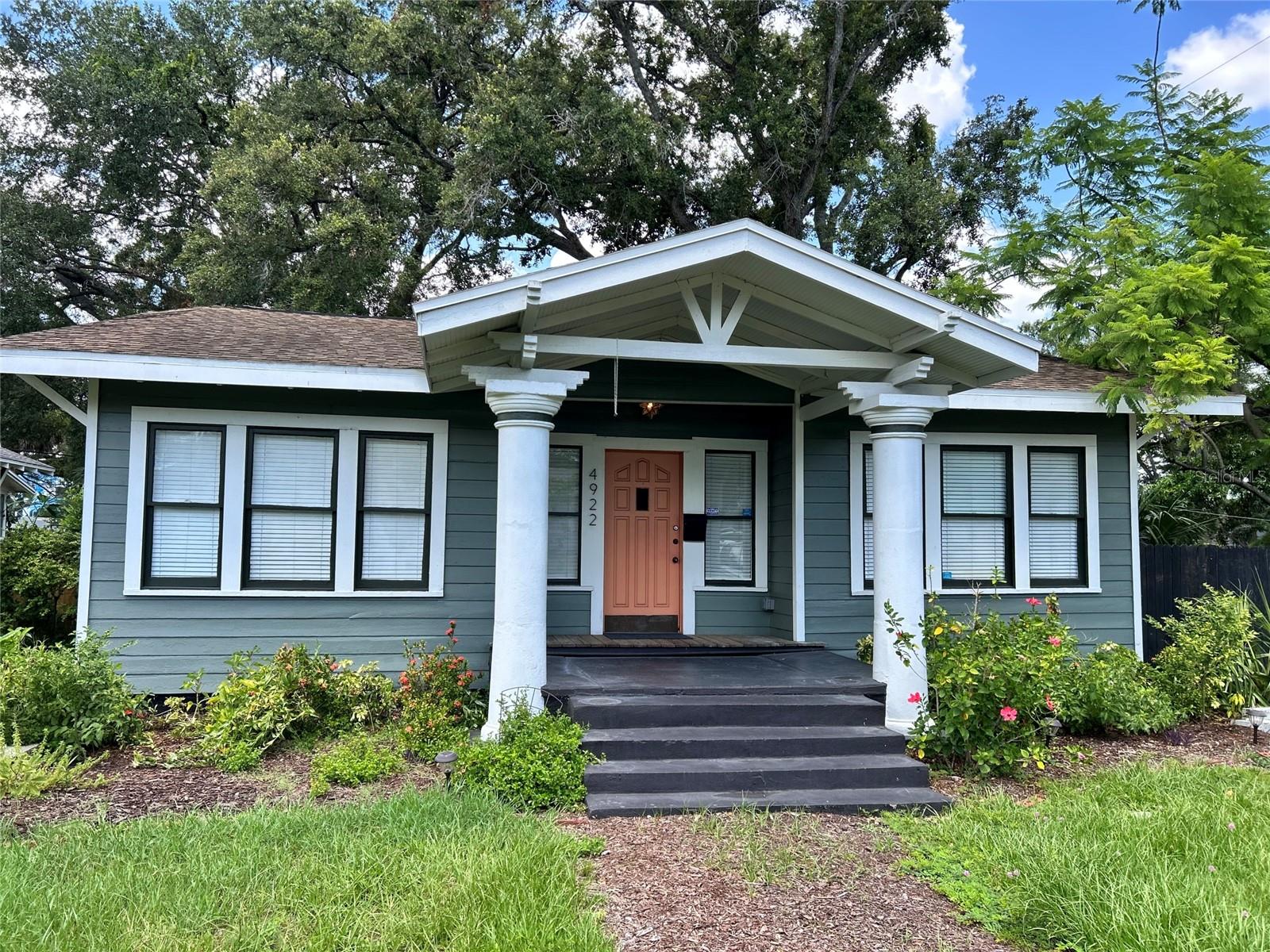 Virtually Staged. Light-filled 1926 bungalow in the heart of Seminole Heights, where historic charm meets modern updates. Just minutes from Downtown Tampa and Armature Works, and within walking distance of vintage shops, local restaurants, breweries, and neighborhood favorites.

Situated on a corner lot, this home features two bedrooms connected by a Jack-and-Jill bathroom, plus an updated kitchen with porcelain cement-inspired tile floors, subway tile backsplash, butcher block countertops, and newer stainless steel appliances, including a gas range.

The freshly painted interior showcases hickory hardwood floors throughout, high ceilings, and crown molding. Major system updates include plumbing, electrical, HVAC, foundation improvements, and a tankless water heater, offering the charm of a historic home with the confidence of modern infrastructure.

Enjoy a fully fenced yard with plenty of room for entertaining, gardening, or letting pets play. A storage shed and new Samsung stackable washer and dryer are included. No HOA. Natural gas services both the range and tankless water heater. Located outside the flood zone.