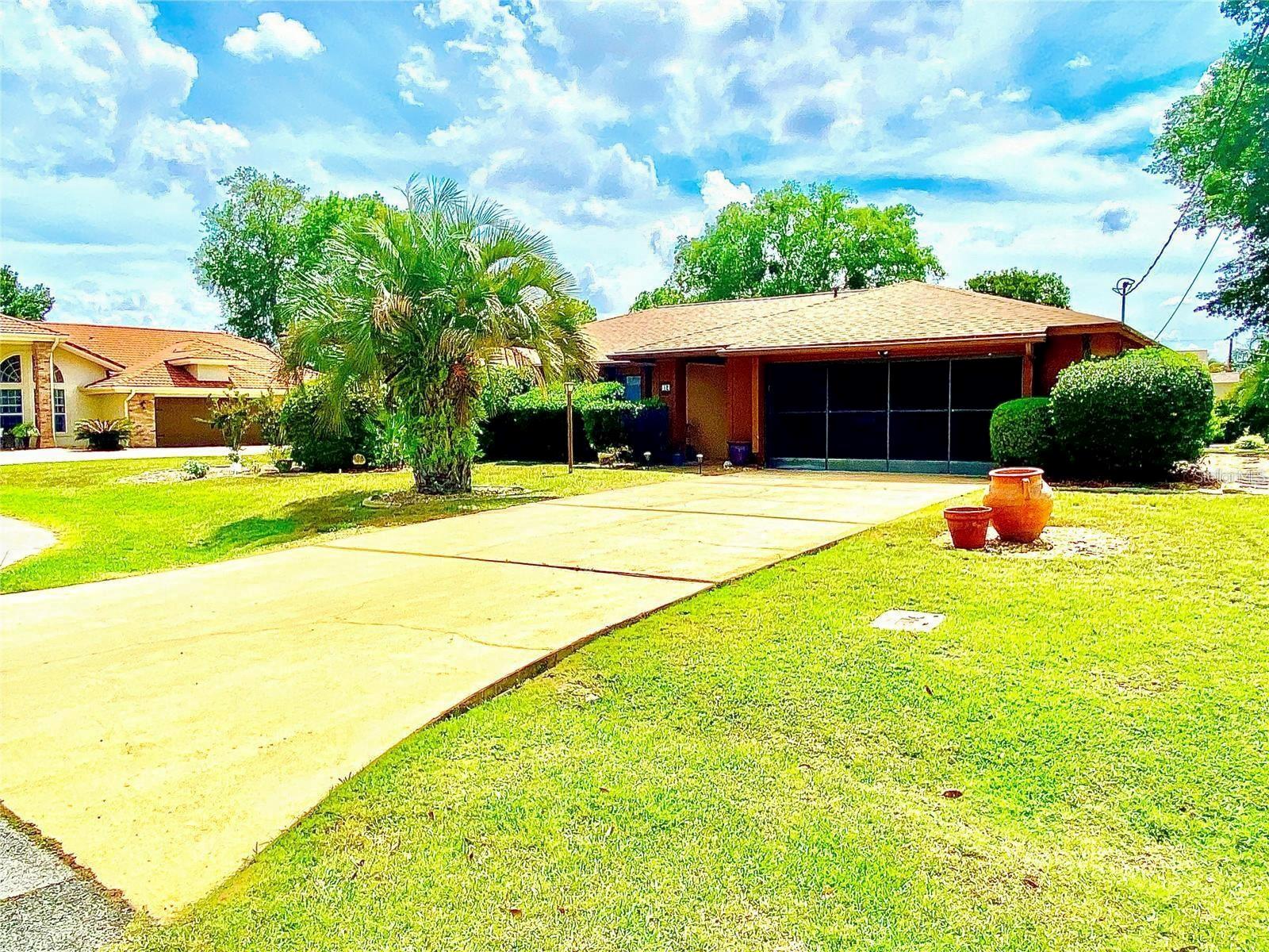 Move-in ready concrete block home located on a quiet cul-de-sac in the desirable Pine Lakes of Palm Coast! This 2-bedroom, 2-bath split floor plan offers a 2-car garage, spacious living and dining areas, a family room, and a breakfast nook. Recent improvements include a new roof (2024), well-maintained HVAC system. Enjoy the oversized 310 sq. ft. covered and screened lanai, perfect for relaxing or entertaining. Conveniently located just 2 miles from Advent Health Palm Coast, 2 miles to US-1, 4 miles to I-95, and less than 11 miles from Flagler Beach. Close to shopping, dining, golf, parks, and everyday conveniences. Ideal as a primary residence, seasonal getaway, or investment property. Schedule your private showing today!
