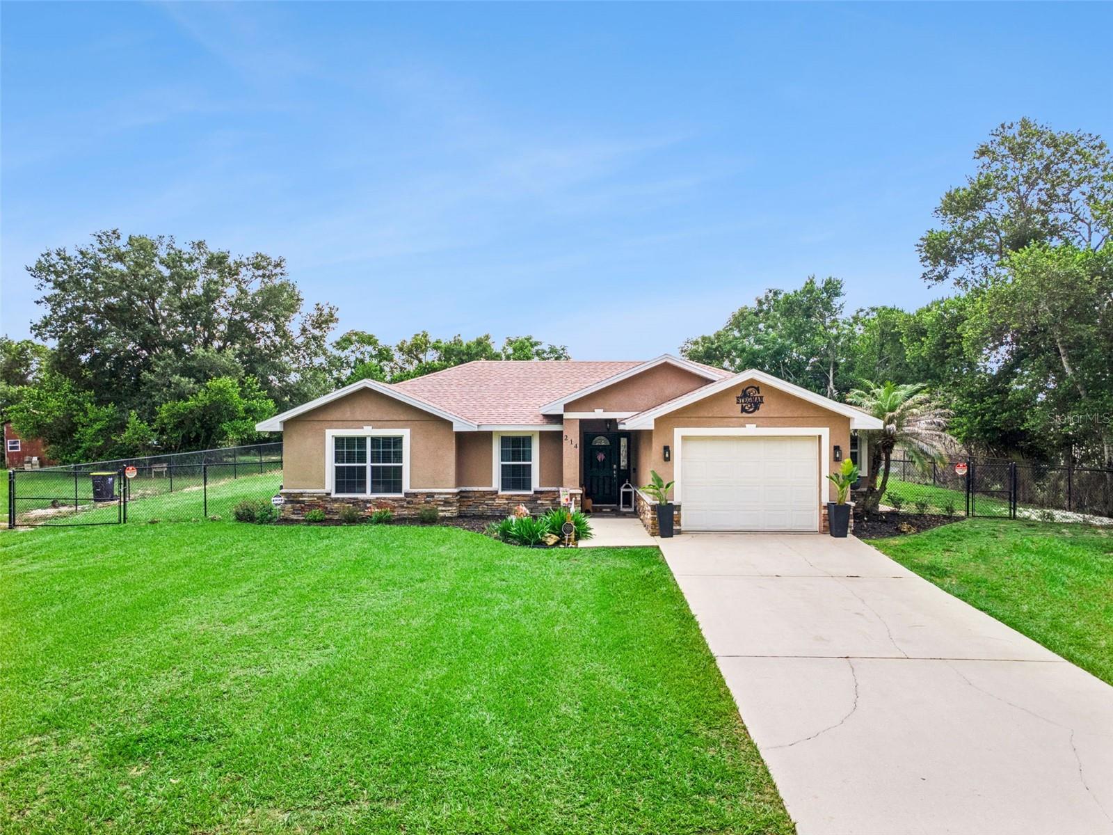 Welcome to 214 Mountain Dr, this beautiful 3-bedroom, 2-bathroom home in the peaceful community of Babson Park! Built in 2008, this move-in ready home offers the perfect blend of comfort and convenience with no HOA. Inside, you'll find beautiful bamboo flooring that adds warmth and character throughout the home. Major updates include a new roof (2024) and new drainfield (2025), providing peace of mind for years to come. Step outside to enjoy the oversized, fully fenced backyard with plenty of room for pets, play, gardening, or entertaining. A storage shed conveys with the property, while the 1-car garage offers additional storage and parking. The home also features a shallow well for irrigation, helping maintain the landscaping while keeping water costs down. Whether you're looking for your first home, your next home, or a great investment opportunity, this property offers exceptional value in a quiet Babson Park location. Don't miss you opportunity to make this home yours - schedule your private showing today!