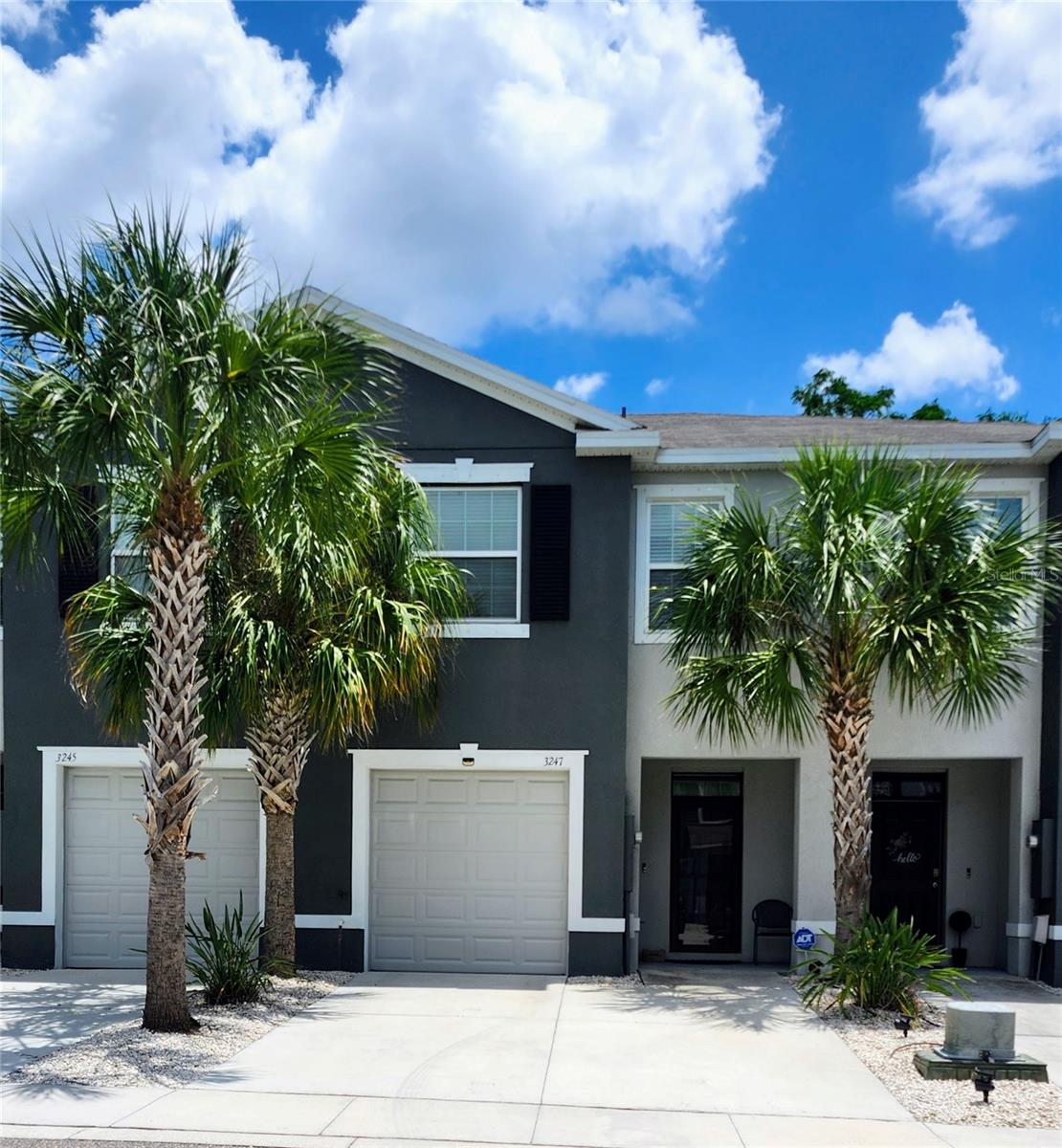 SELLER OFFERING $5000 CONCESSIONS THROUGH JUNE 15TH! Maintenance free living in this immaculately kept 3 bedroom, 2.5 bathroom townhouse with garage is a Must See! Located in the desirable Bloomingdale neighborhood in The District. LOW HOA, Pet Friendly, NO Flood Zone, No CDD! Step inside to a light and bright open-concept floor plan featuring modern color combinations, ceramic tile flooring downstairs, and Brand-New Upgraded Luxury Vinyl flooring on the stairs and upper level adding style and durability. The spacious kitchen showcases wood cabinetry, granite countertops & center island as a great focal for entertaining or family time. Escape for some privacy or enjoy the outdoor weather in the large screen enclosed back patio. Upstairs  find the 3 nice sized bedrooms, laundry with full sized washer & dryer, and many closets throughout adding to the homes functionality. The primary suite has everything you need; double walk-in closets, private ensuite bath with dual sinks & shower creating a relaxing retreat. Additional highlights include an under stairs storage space, 2 driveway parking spaces out front, along with the safety of solid concrete built construction for peace of mind. Maintenance fee covers cable, internet, water, trash, & maintenance grounds. Enjoy all kinds of close by shopping, restaurants, parks, entertainment, along with top rated schools!