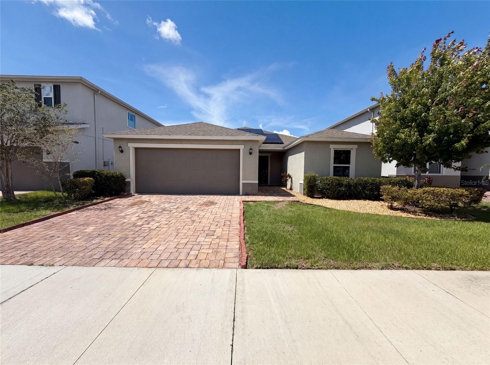 Virtually Staged. 11534 Brighton Knoll Loop is a 1-story Riverview single- home built in 2017, designed for single-level living across four bedrooms. The kitchen includes stainless steel appliances, dark wood cabinetry, and a center island that adds prep space and casual seating. The open main living area connects to a sliding glass door for direct backyard access, and ceiling fans throughout help regulate airflow. The primary bedroom has a walk-in closet for organized storage, while the bathroom includes double sinks to ease morning routines and a separate tub and shower. A covered patio and fully fenced backyard backing to a pond extend the usable space, and an attached two-car garage completes this well-maintained residence with practical amenities throughout every room.. Included 100-Day Home Warranty with buyer activation