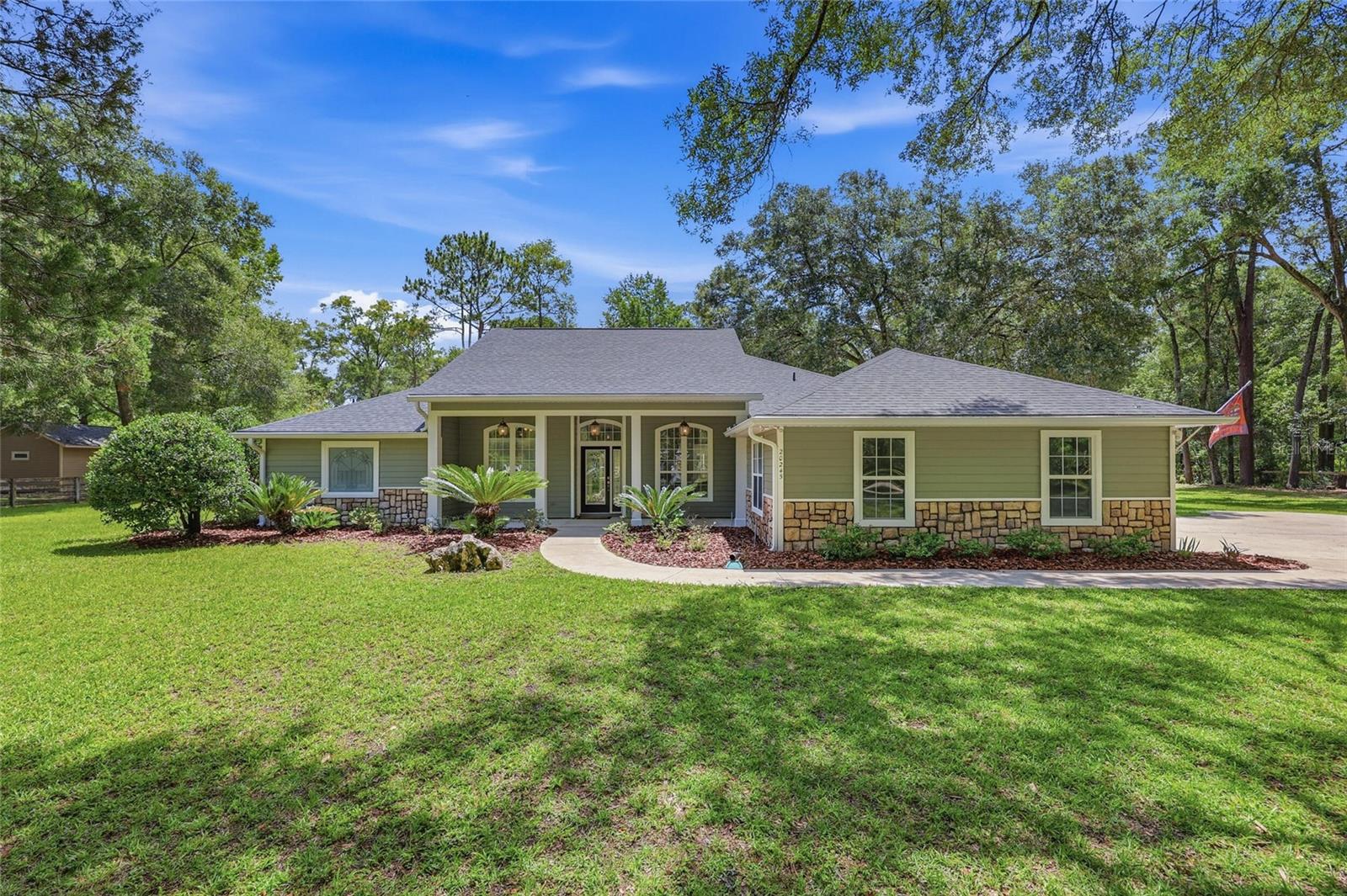 Beautifully maintained 3-bedroom, 2-bath home offering 2,151 heated and cooled square feet on a 2.6-acre cul-de-sac lot in River Run Plantation. The home features a functional floor plan with spacious living areas, abundant natural light, and well-maintained finishes throughout.

Outdoor amenities include an in-ground pool, lanai, and open acreage with multiple opportunities for outdoor use. The layout of the home, pool, and lanai creates a seamless connection between indoor and outdoor living areas.

A notable feature of the property is the approximately 1,500-square-foot detached garage, providing space for vehicle storage, recreational equipment, workshop activities, hobbies, or additional storage.

Recent improvements include:
• New Detached Garage (2023)
• New Roof (2023)
• New Exterior Paint (2023)
• New HVAC System (2022)
• New Water Heater (2025)

Located on 2.6 acres within River Run Plantation with convenient access to High Springs, area parks, recreational opportunities, shopping, dining, and major roadways.