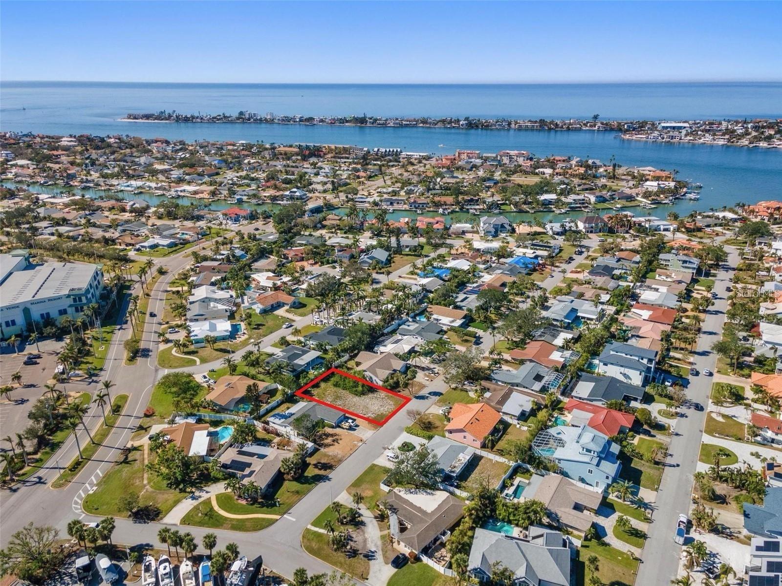 Great opportunity to build, as this area has an approx. elevation estimated at 9'.  Surrounding homes did not flood in the storms of 2024.  Owners plan was to grade up to 12' elevation, as currently required by the City of St Pete, and have a one story home on this lot (similar home built nearby).  This is an opportunity to keep a boat very closeby, as the High and Dry boat storage is just steps away; so easy to head out on the water! Also walkable is the restaurant Island Grille; just around the corner. This is a unique opportunity to live in a beautiful, highly desirable waterfront community without paying for direct waterfront, and just a short drive from more restaurants in downtown Tierra Verde as well an the renown Ft Desoto Park! Also, just a short drive away is the infamous Don Cesar Resort Hotel, and all that St Pete Beach has to offer.  Tierra Verde is a great community in a wonderful, convenient location!  Listing agent is owner and had planned to build her dream home there with fiancé; unfortunately he has health problems so they can no longer build.