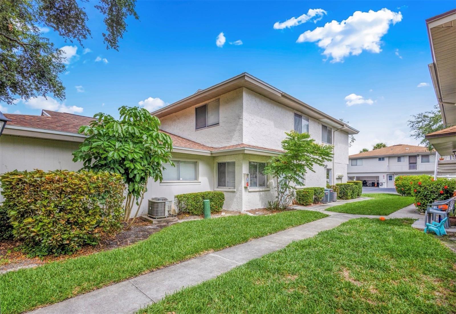 This charming 2-bedroom, 1-bath condo is nestled in a serene, beautifully landscaped community, offering an inviting blend of comfort and tranquility. The main floor greets you with an open and airy living room, a cozy dining area, and a practical galley-style kitchen—perfectly suited for day-to-day living. Upstairs, you’ll find a spacious master bedroom with a walk-in closet, a well-appointed second bedroom, and a full bath, all designed to ensure both functionality and comfort for any lifestyle.

The community further elevates the appeal with its peaceful ambiance, offering scenic walking paths that lead to a sparkling swimming pool and a picturesque boardwalk trail ending at a tranquil fishing dock overlooking Tampa Bay. Ideally located, this condo is just 5 minutes from Cove Cay Golf Course and a short 10-minute drive to an abundance of shopping, dining, and entertainment options. Recent updates include new flooring and fresh interior paint completed a year ago, as well as a hot water heater that is only 5 years old. Don’t miss this incredible opportunity to own a home that combines convenience, value, and a relaxed lifestyle—schedule your showing today!