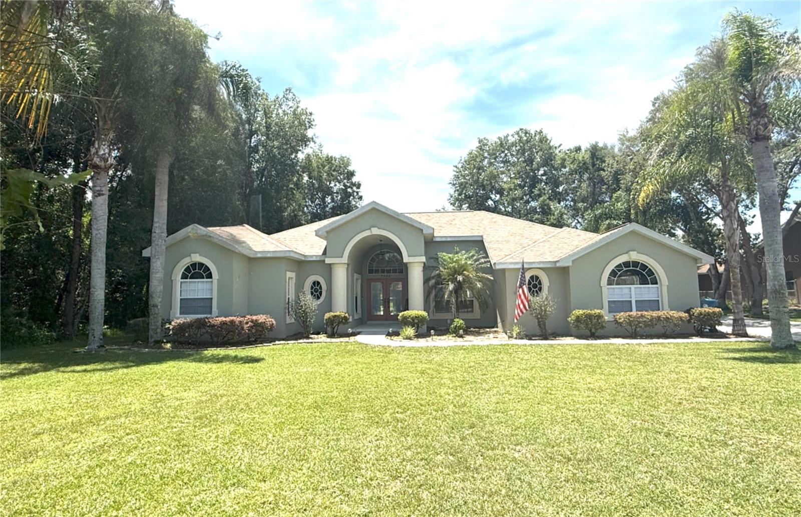 Come check out this IMMACULATE all brick Cayman Built Home with a BRAND NEW ROOF in the desirable River Country Estates! This 3 bed, 2 bath plus office, 2,430 sq. ft. saltwater pool home (with pool alarm) is nestled in a little over half an acre of peace, quiet and beauty. This home is one of the newer modern homes in River Country Estates, from the colonial style columns at the front porch to the corian countertops, stainless steel appliances, formal dining and living rooms, family room and eat in kitchen, his and hers master closets and walk in closets for 2nd and 3rd bedrooms, jetted jacuzzi tub, 3 car garage, deep well water for sprinklers (front and back) providing a gorgeous lawn all year round with mature trees providing shade and lush landscaping. This gorgeous home also offers a "caretaker" filter system in pool. Owners have taken AMAZING care of this home adding improvements such as an upgraded 5 ton Trane air conditioner, 50 gallon hot water heater, salt water system in pool, new wood floors and carpet (in bedrooms), exterior paint, pool lanai screen and new tracks and rollers for sliding glass doors that open up wall to wall to pool on two sides. Someone is getting a gem with this one!!! DON'T MISS OUT!