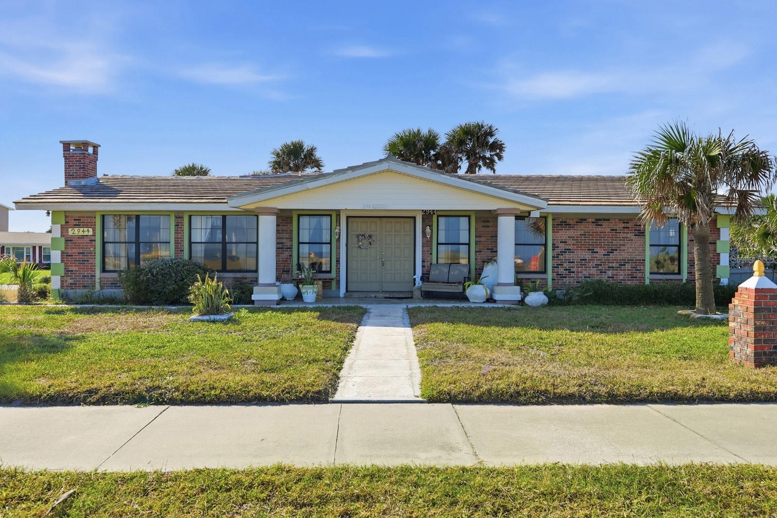 Wake up to the Atlantic just steps from your door with this rare coastal property in Ormond Beach where sweeping ocean views and true shoreline access create an exceptional opportunity. Located directly across from the dunes with riparian rights, this property includes ownership beyond the roadway to the sandy landscape itself, allowing you the unique ability to design and build your own private beach walkover or shaded pergola and enjoy a truly personal connection to the shoreline.

Situated on a 0.26 acre corner lot that borders conservation, this three bedroom two bath home offers 2,229 square feet of well planned living space and a strong foundation for someone ready to customize a true oceanfront retreat. The spacious kitchen features a large center island, double ovens, stainless steel appliances and custom cabinetry, providing an excellent base for both everyday living and future upgrades.

Enjoy the flexibility of short term rentals with a 30 day minimum, making this property as attractive to investors as it is to full time residents and second home owners. Owners also have the option to participate in the voluntary Beau Rivage Homeowners Association, which provides access to an additional community beach walkover for convenient shoreline access.

This is a rare opportunity to own a home that combines direct proximity to the ocean, private beachfront rights, conservation views and an enviable Ormond Beach location in one of the area’s most sought after coastal settings. Schedule a private tour today!