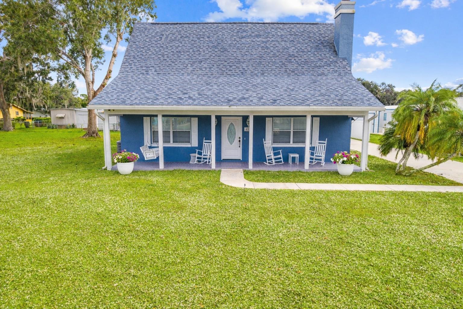 One or more photo(s) has been virtually staged. Back on the market with a major price improvement — your opportunity to own a slice of true Florida paradise has arrived.  Welcome to “Paradise” in Lake Marian Shores! This Custom 2- Story home has 2 Bedrooms, 2 Full Bathrooms, and was well crafted with longevity in mind. Impeccably maintained, this gorgeous home was occupied
only part time over the past 30 years as a vacation get-away for the owners. Pride of ownership is evident in the Hand-Selected Finishes, the Floor-To-Ceiling Stone on the beautiful Wood Burning Fireplace, Custom Built
Bathroom Vanity and Oak Finishes throughout. Functionality was paramount in the design of this 2-story home offering a Bedroom and One Full Bath with a Tub on the 1st Floor and another Bedroom with a Full Bath and
a Large Shower on the 2nd floor. The Vaulted Ceilings allow for a 15’x 8’ Loft, providing a comfortable space for reading or additional overnight guests. The open floor plan is great for social gatherings with access to a
Fully Functional Kitchen with lots of counterspace on the Large Breakfast Bar, which also provides additional seating. Features continue to be impressive as you move through the house to discover a Large Inside Laundry
Room with extra storage cabinets. As you head out back, you’ll notice the convenience of a Covered Breezeway to the Detached 2 Car Garage with a separate electrical panel, plenty of room to work, and the option of
Finishing out the 2nd Floor Bonus Room above the Garage. The property has Deeded Ownership to a Boat Slip on Lot A, across the street on a freshwater canal, providing direct access to Lake Marian! Bring Your Boat!
Lake Marian, a 6,000-acre, 8 mile long, spring-fed lake, is known as the “best Crappie lake in the state,” according to the Florida Freshwater Commission. Surrounded by 110,000+ acres of wildlife preserves and cattle
ranches, come enjoy the relaxation of the Kenansville lifestyle. Conveniently located 35 minutes from St. Cloud, 45 minutes from Melbourne, one hour from Vero Beach and one hour from Orlando, “Paradise” is a home
that has it all and offers that “Sanctuary” feel. Whether you are looking for a Seasonal Fisherman’s Retreat or a Skillfully Constructed Masterpiece as a primary home, This Is It!