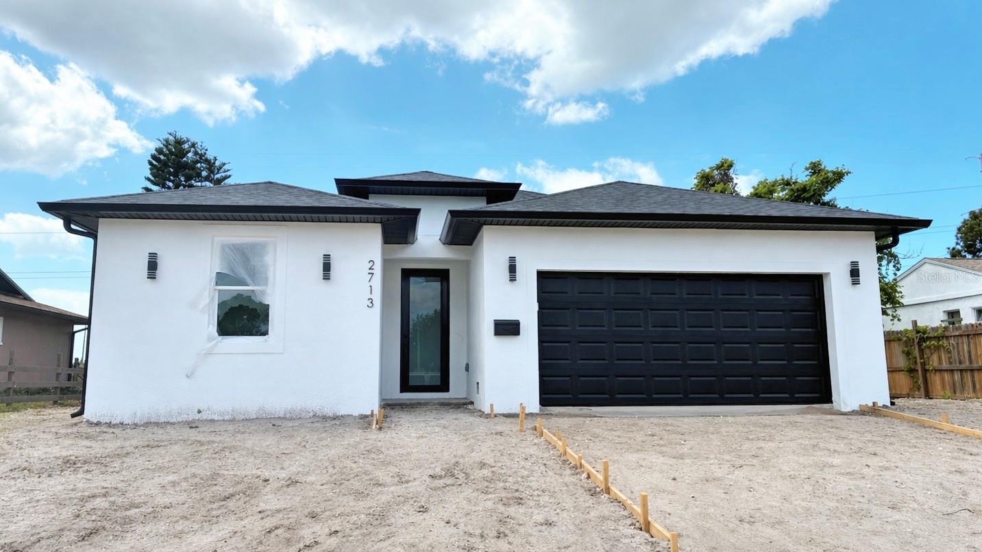 Under Construction. Brand new 2026 waterfront construction with no HOA completion May 2, 2026. Builder direct sale, builder warranty included. This canal front home in Holiday, FL delivers what 2026 buyers chase: new construction, water frontage, zero HOA, and Gulf Coast access minutes from Tarpon Springs and Anclote River Park.
Architectural curb appeal sets the tone with contrasting exterior finishes and a dark accent garage door. Inside: soaring ceilings, oversized windows, and an open concept layout in luxury vinyl plank throughout. Light quartz countertops anchor the kitchen and baths, paired with frameless glass showers and designer tile.
Every closet is fully built out with custom organization a $5K+ upgrade already done. Brushed nickel fixtures, primary suite with spa style ensuite, flexible secondary bedrooms, attached two car garage.
The yard opens onto a quiet canal (non navigable) with room to add a dock for kayaking, paddleboarding, or fishing. No HOA your property, your rules.
Move in ready May 2, 2026. Schedule your private showing be the first to walk through.